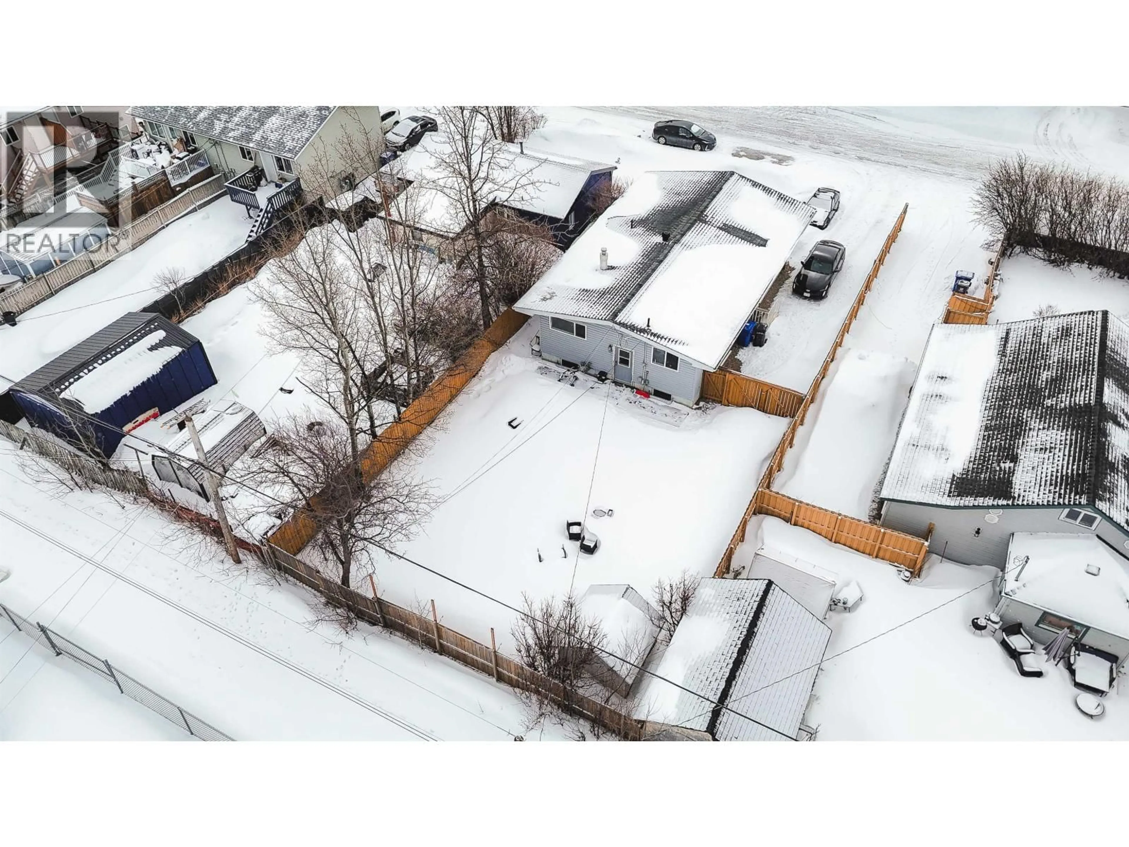 A pic from outside/outdoor area/front of a property/back of a property/a pic from drone, street for 10216 103 AVENUE, Fort St. John British Columbia V1J2H8
