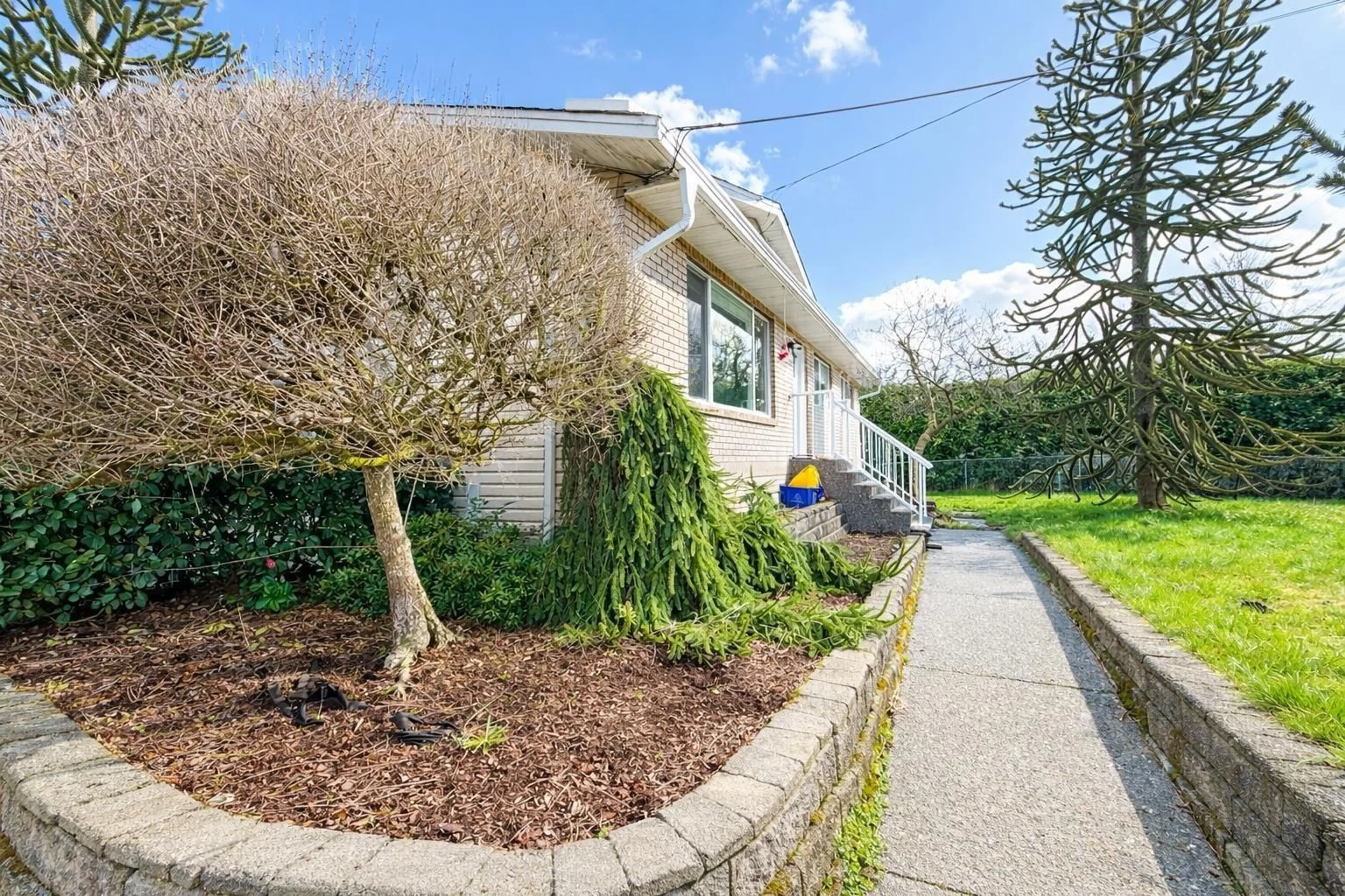 Home with vinyl exterior material, street for 21355 OLD YALE ROAD, Langley British Columbia V3A4M6