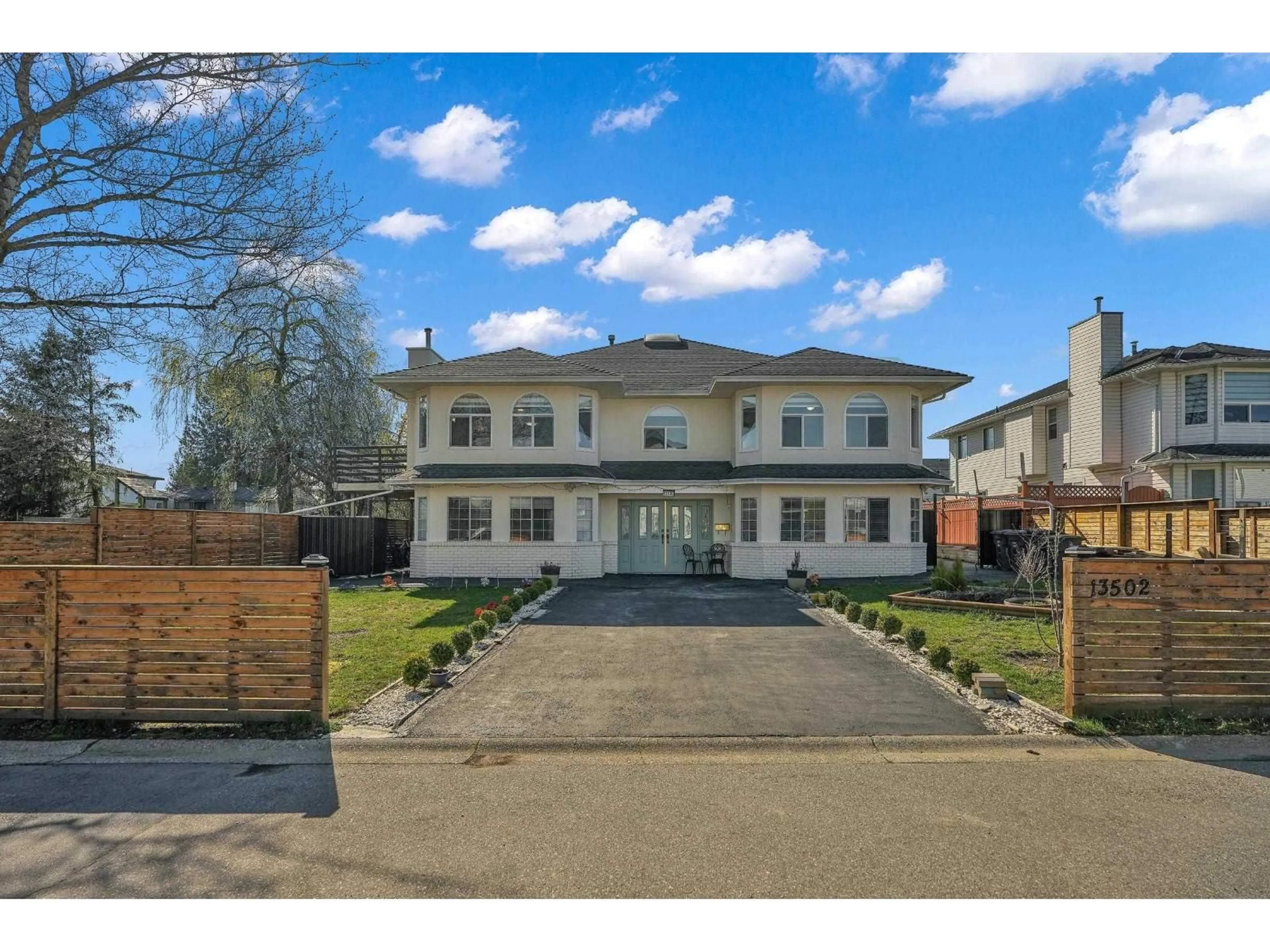 A pic from outside/outdoor area/front of a property/back of a property/a pic from drone, street for 13502 84A AVENUE, Surrey British Columbia V3W0T8