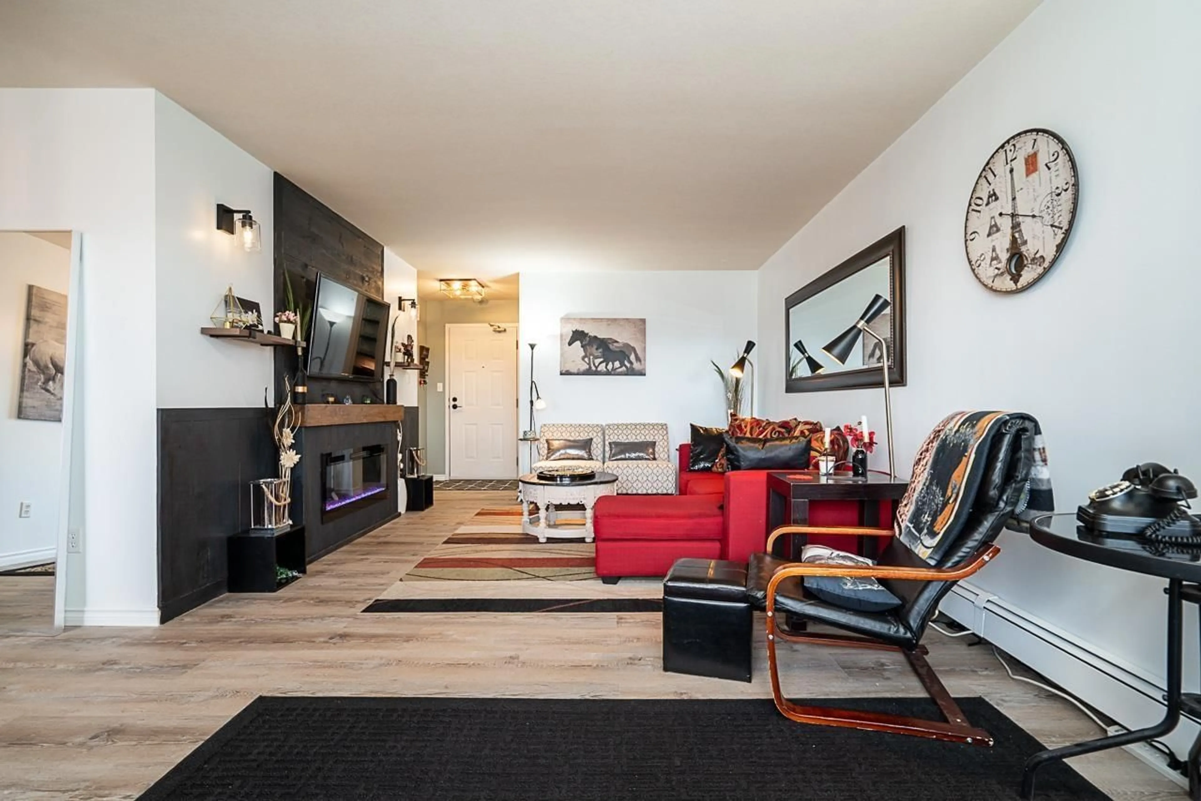 Living room with furniture, wood/laminate floor for 306 - 32823 LANDEAU PLACE, Abbotsford British Columbia V2S6S6