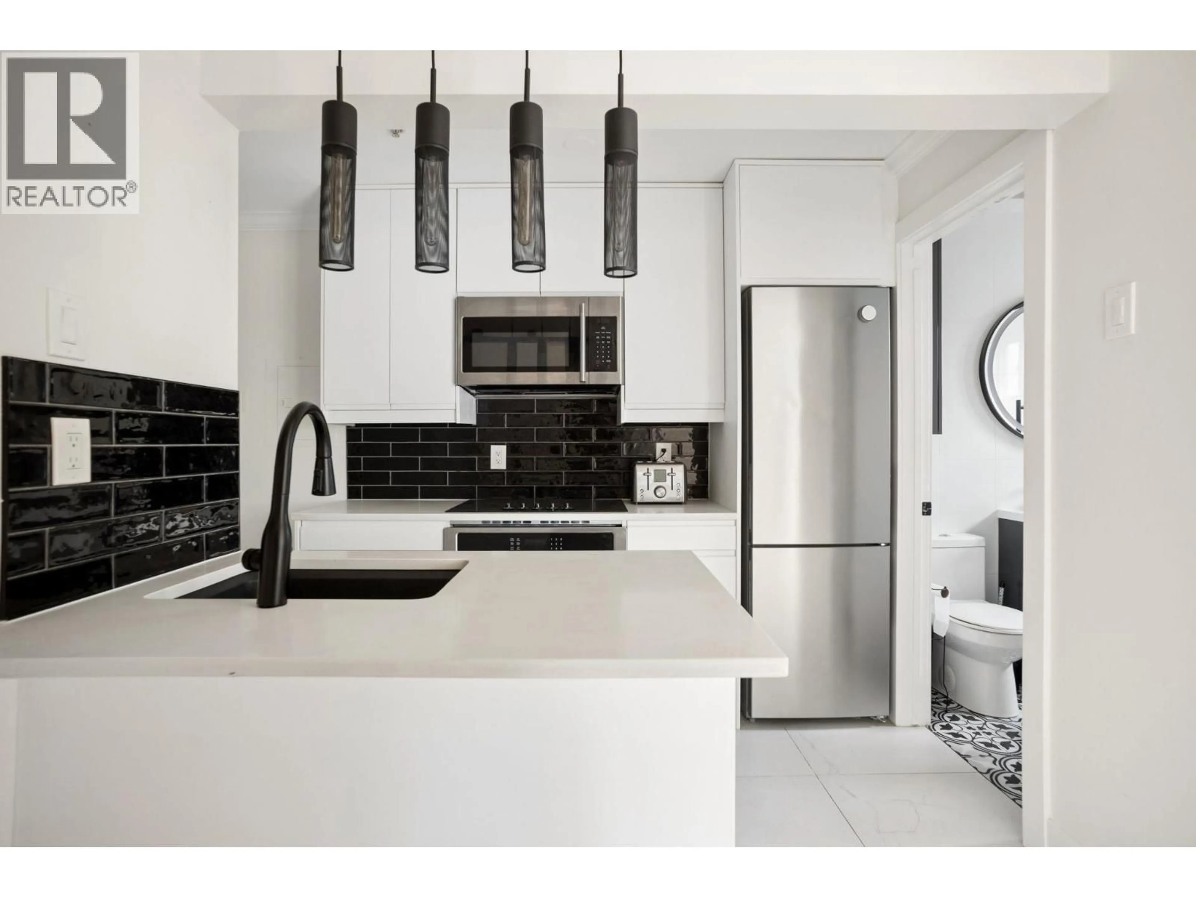 Contemporary kitchen, ceramic/tile floor for 213 - 1940 BARCLAY STREET, Vancouver British Columbia V6G1L3