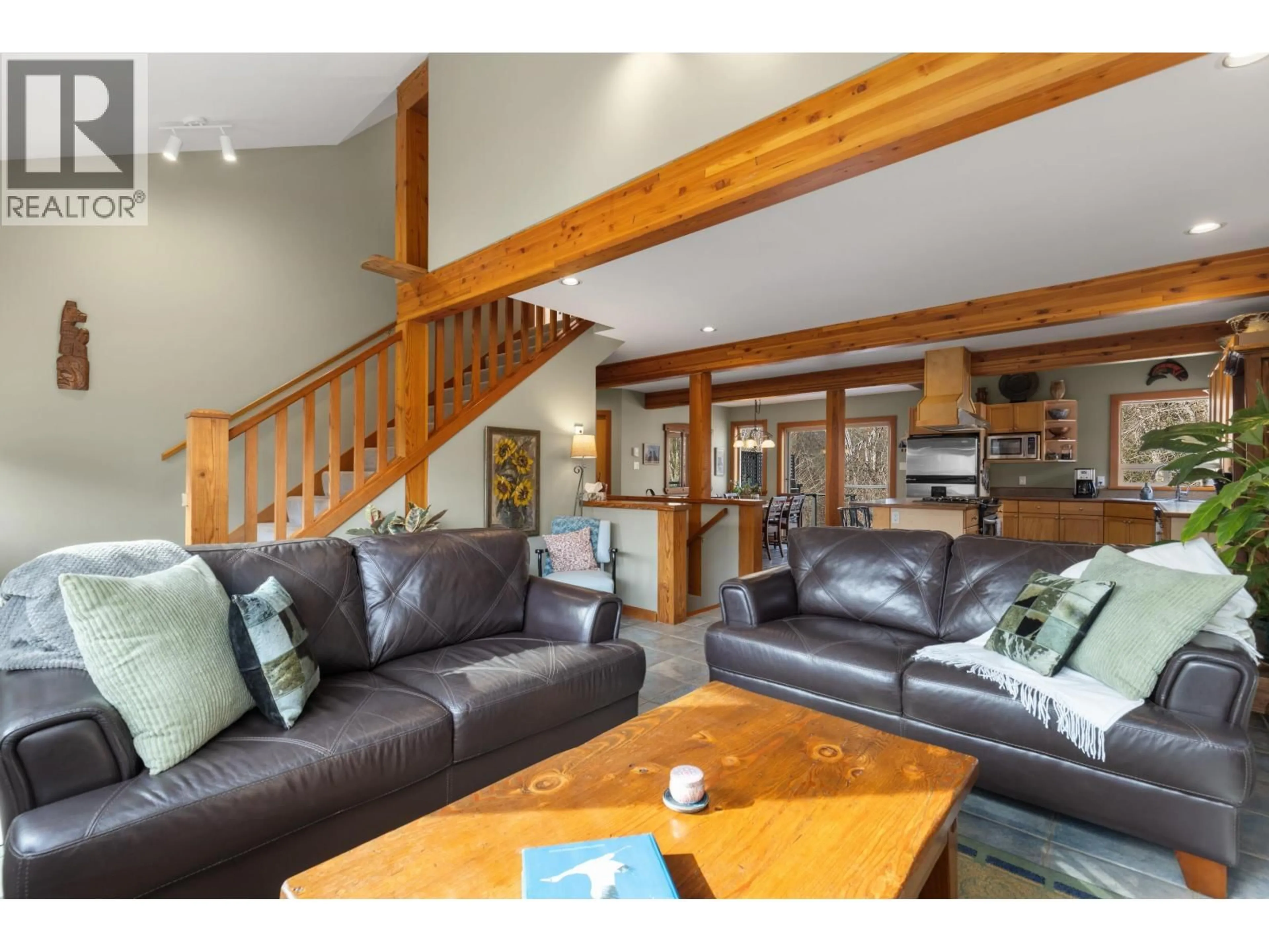Living room with furniture, wood/laminate floor for 1423 WILLOW DRIVE, Pemberton British Columbia V0N2L0
