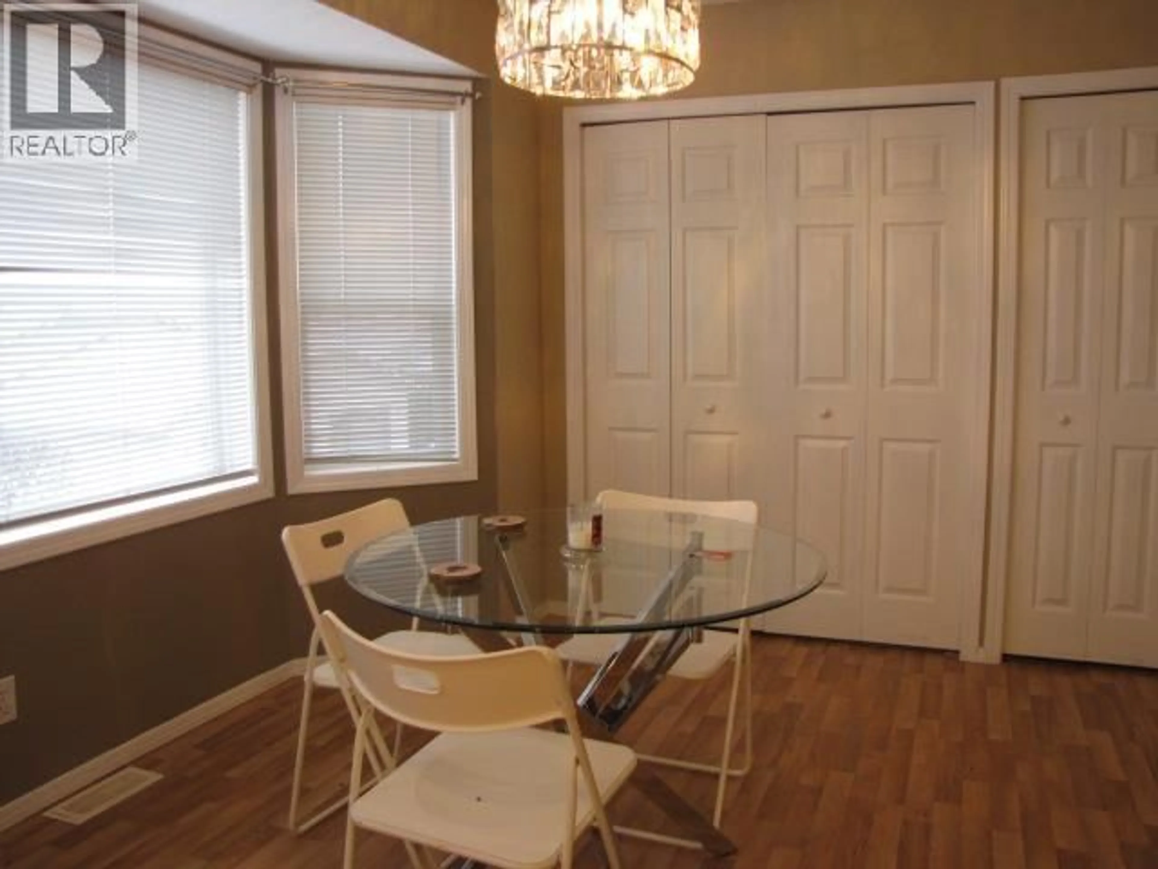 Dining room, wood/laminate floor for 25 - 500 WOTZKE DRIVE, Williams Lake British Columbia V2G4S9