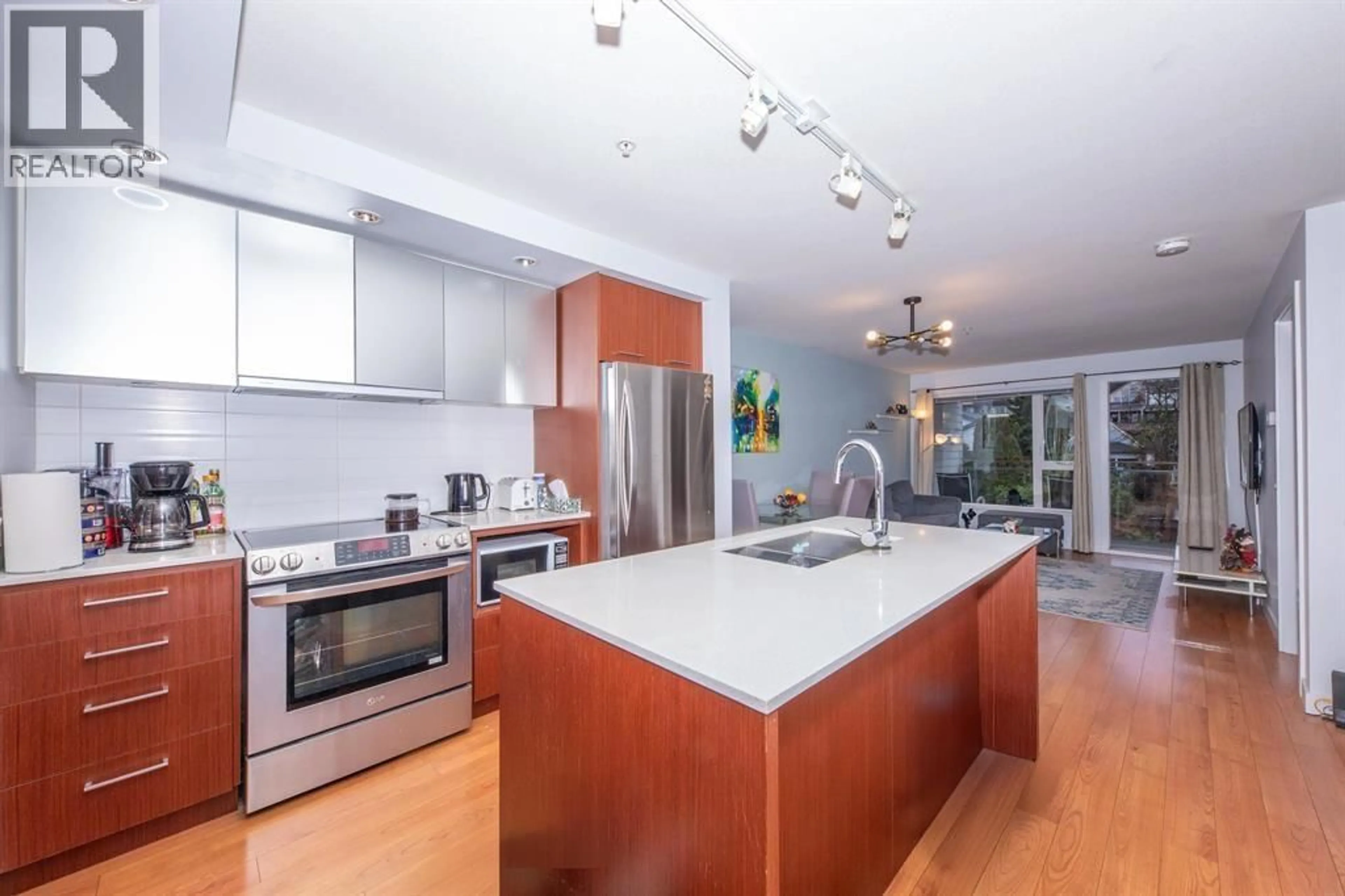 Open concept kitchen, unknown for 414 - 221 3RD STREET, North Vancouver British Columbia V7L0C1