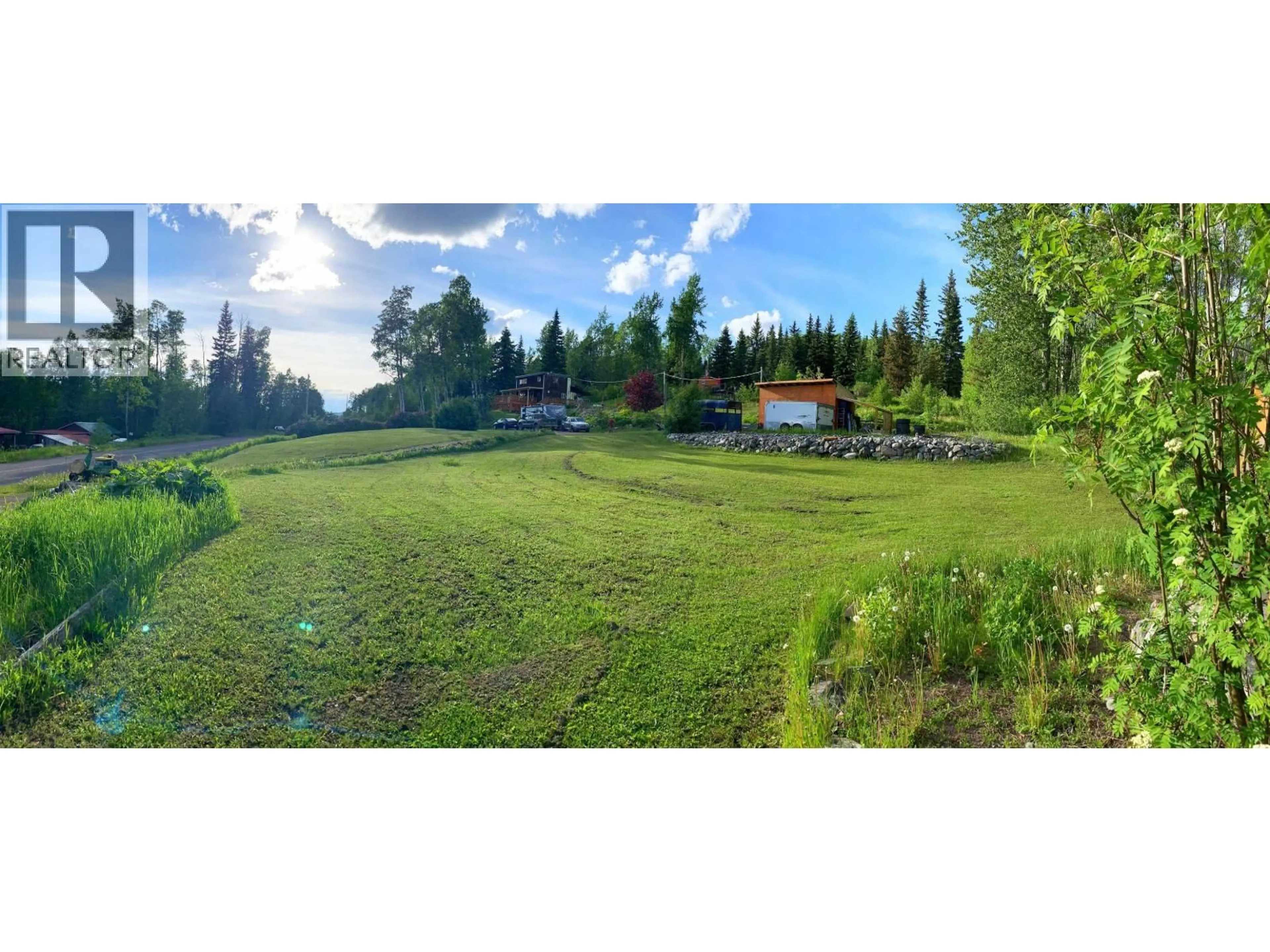 A pic from outside/outdoor area/front of a property/back of a property/a pic from drone, forest/trees view for 11552 TINTAGEL ROAD, Burns Lake British Columbia V0J1E3