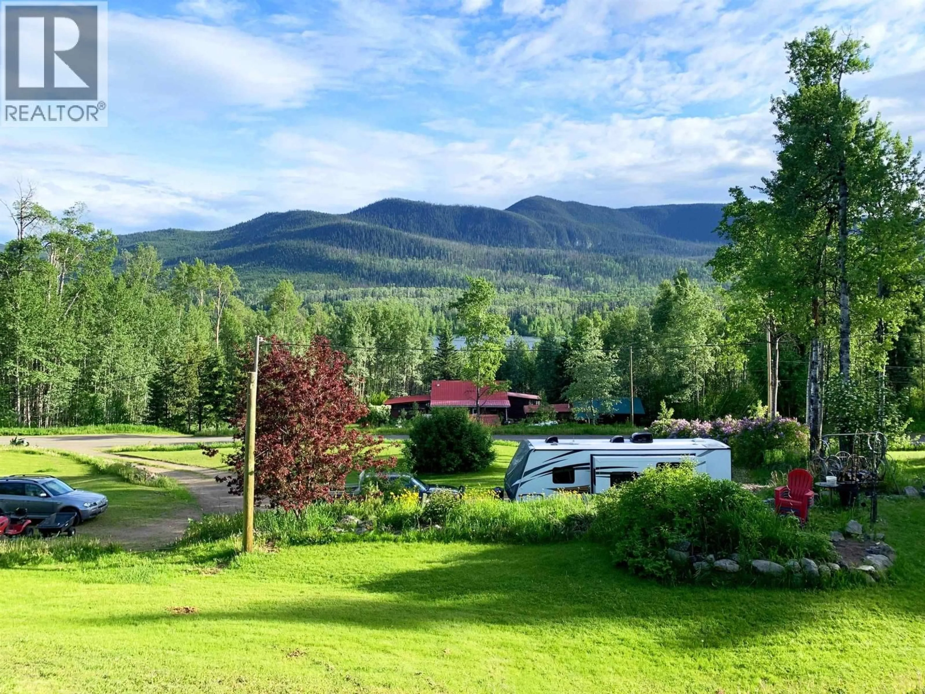 A pic from outside/outdoor area/front of a property/back of a property/a pic from drone, mountain view for 11552 TINTAGEL ROAD, Burns Lake British Columbia V0J1E3