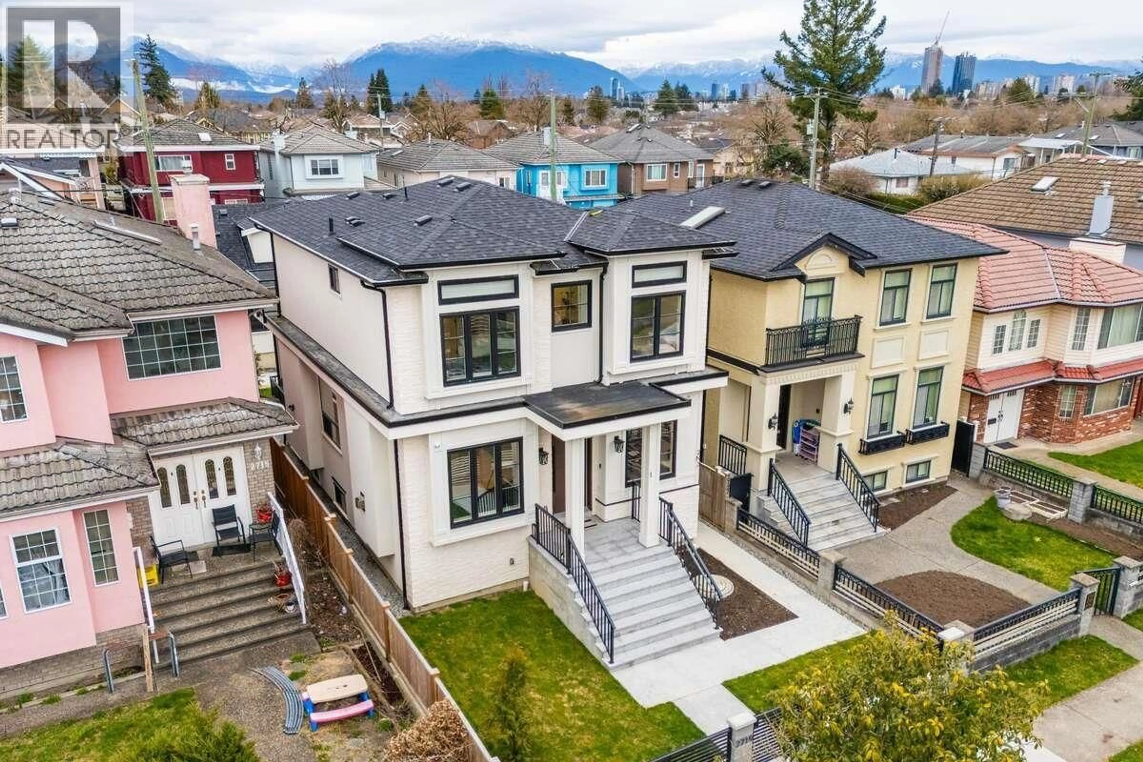 A pic from outside/outdoor area/front of a property/back of a property/a pic from drone, mountain view for 2719 46TH AVENUE, Vancouver British Columbia V5S1A6