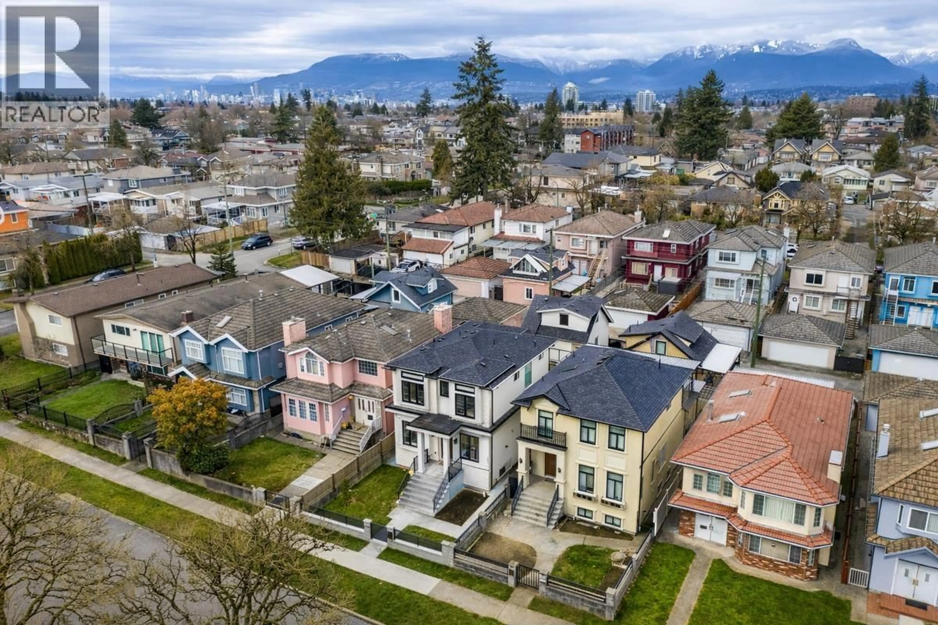 A pic from outside/outdoor area/front of a property/back of a property/a pic from drone, mountain view for 2719 46TH AVENUE, Vancouver British Columbia V5S1A6