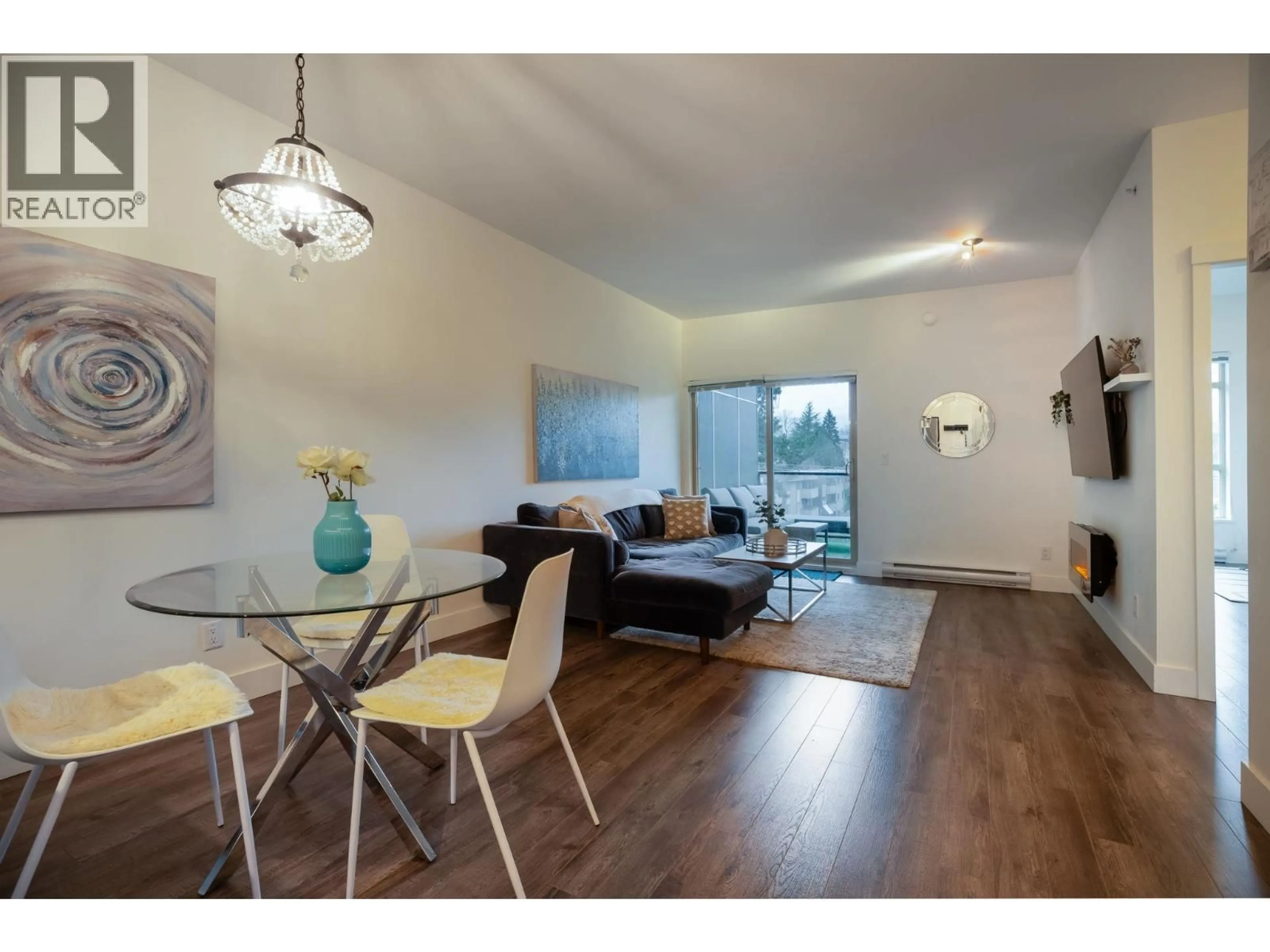 Living room with furniture, wood/laminate floor for 405 - 2436 KELLY AVENUE, Port Coquitlam British Columbia V3C1Y4