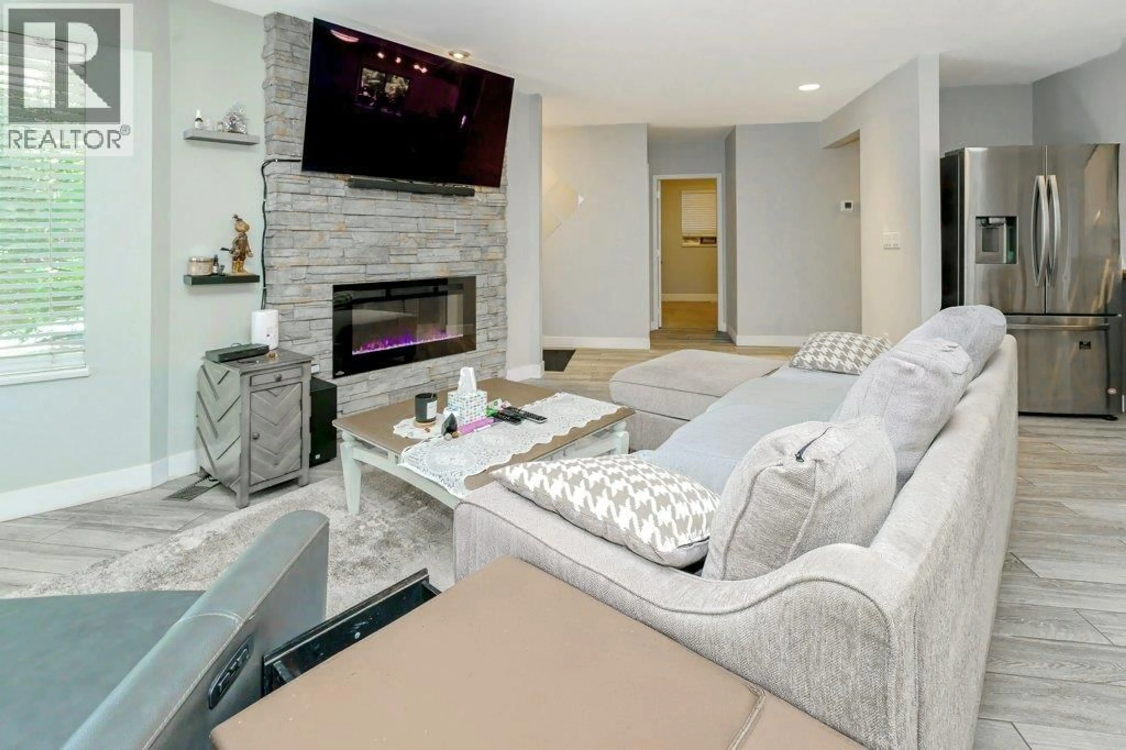 Living room with furniture, ceramic/tile floor for 12060 208 STREET, Maple Ridge British Columbia V2X4W8