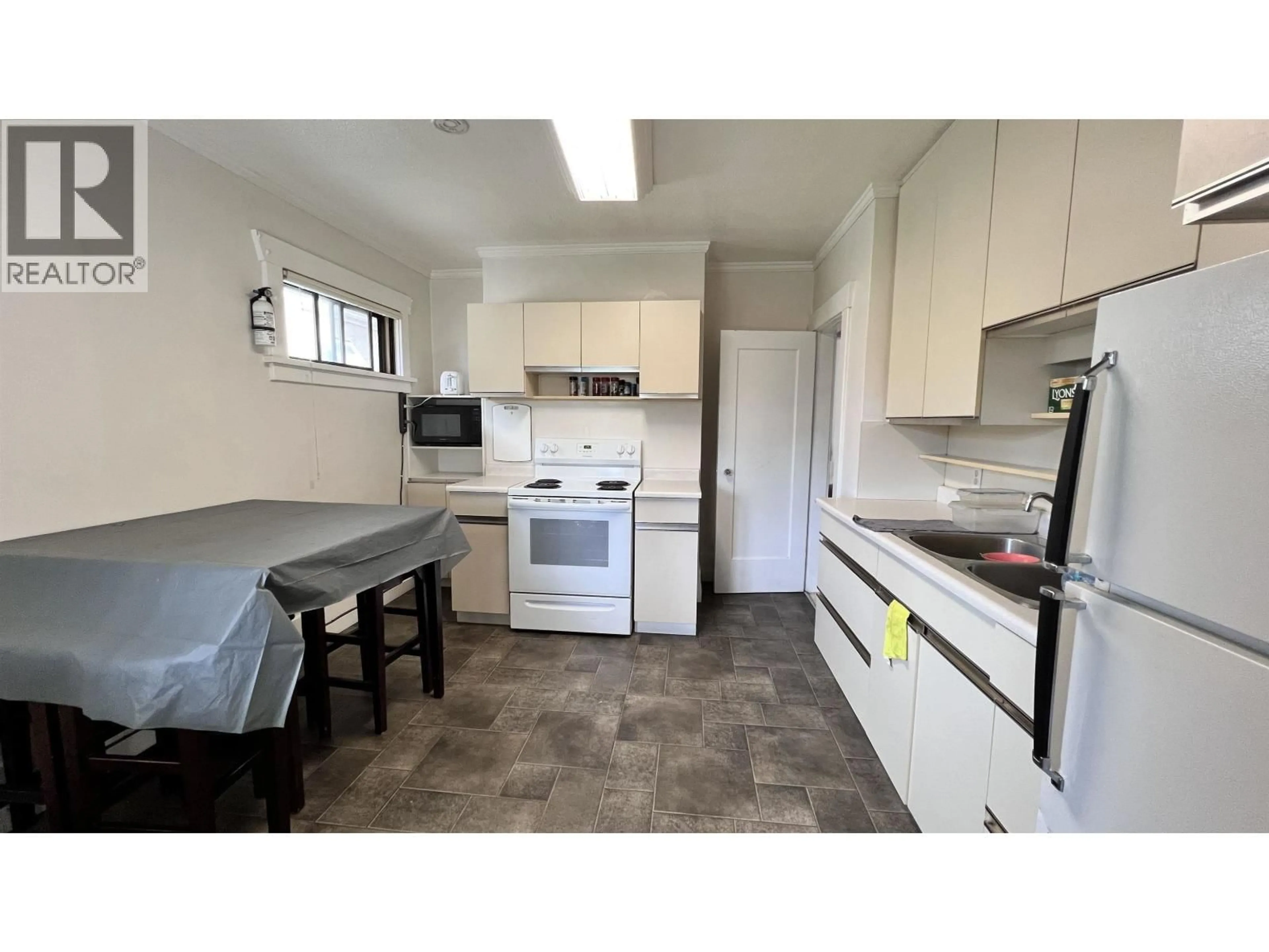 Standard kitchen, unknown for 1250 KING EDWARD AVENUE, Vancouver British Columbia V5V2G4