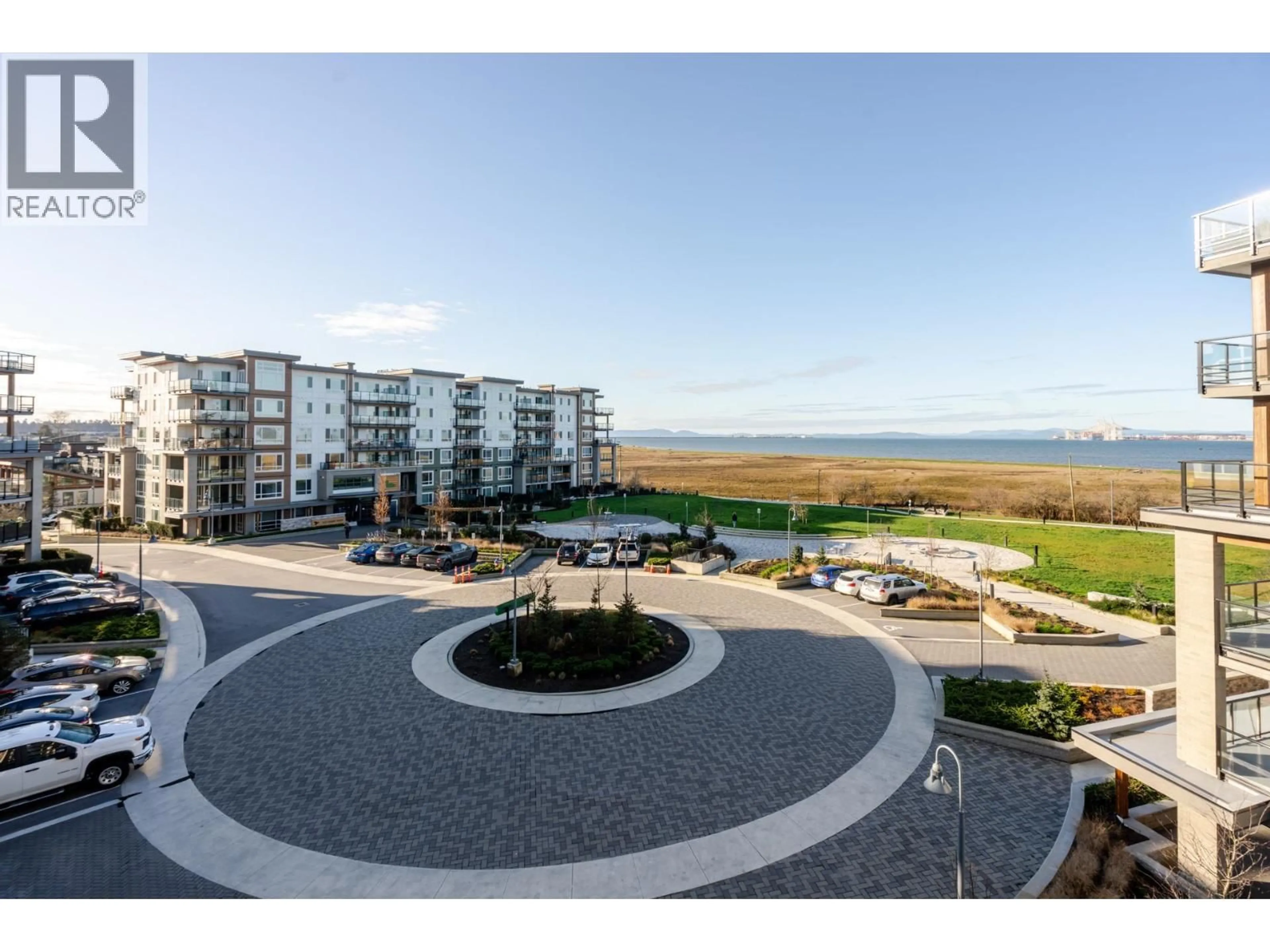 A pic from outside/outdoor area/front of a property/back of a property/a pic from drone, water/lake/river/ocean view for 426 - 2499 RABBIT DRIVE, Delta British Columbia V4M0G4