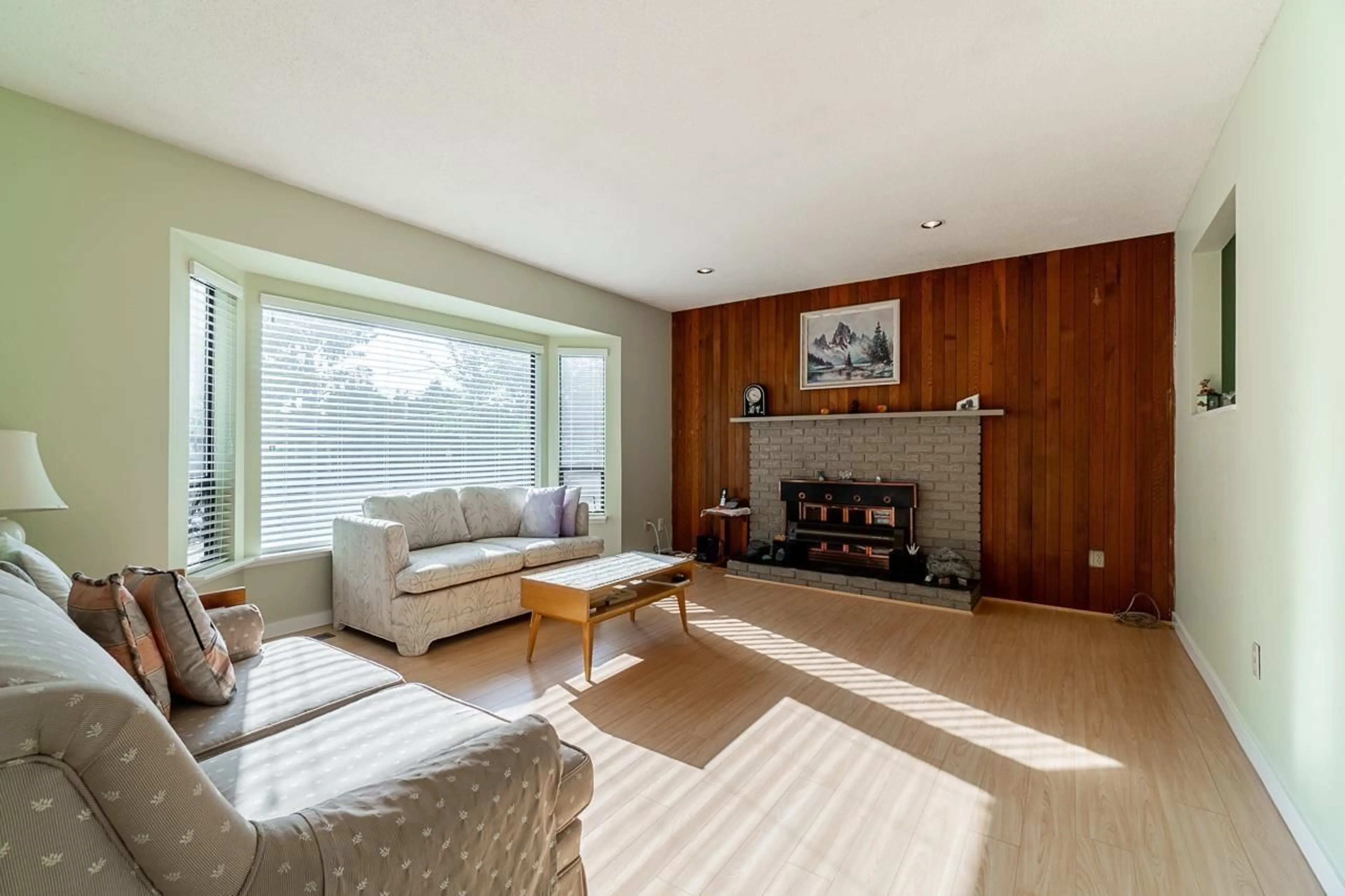 Living room with furniture, wood/laminate floor for 8839 156A STREET, Surrey British Columbia V4N2Y2