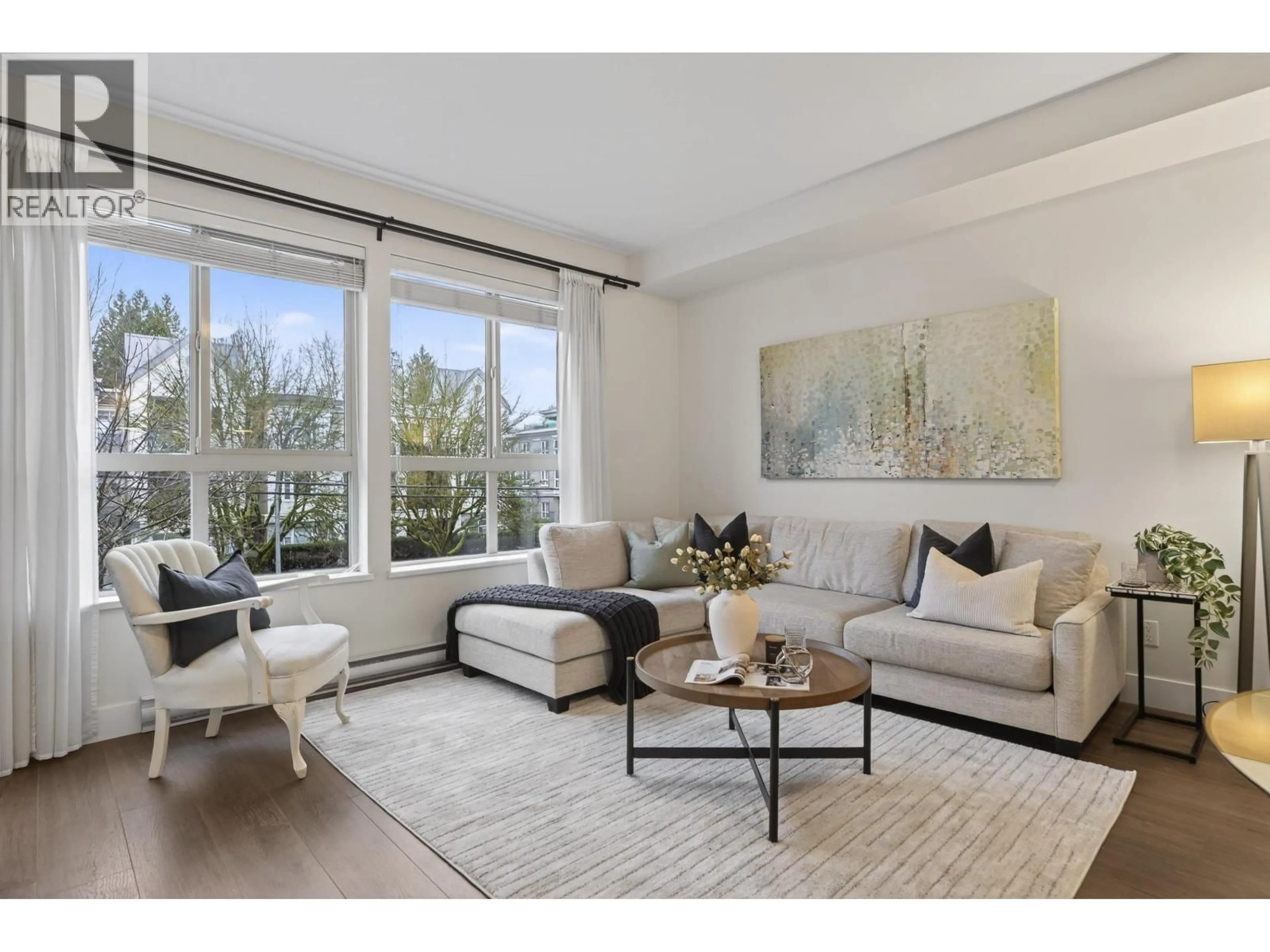 Living room with furniture, unknown for 202 - 2288 WELCHER AVENUE, Port Coquitlam British Columbia V3C1X3