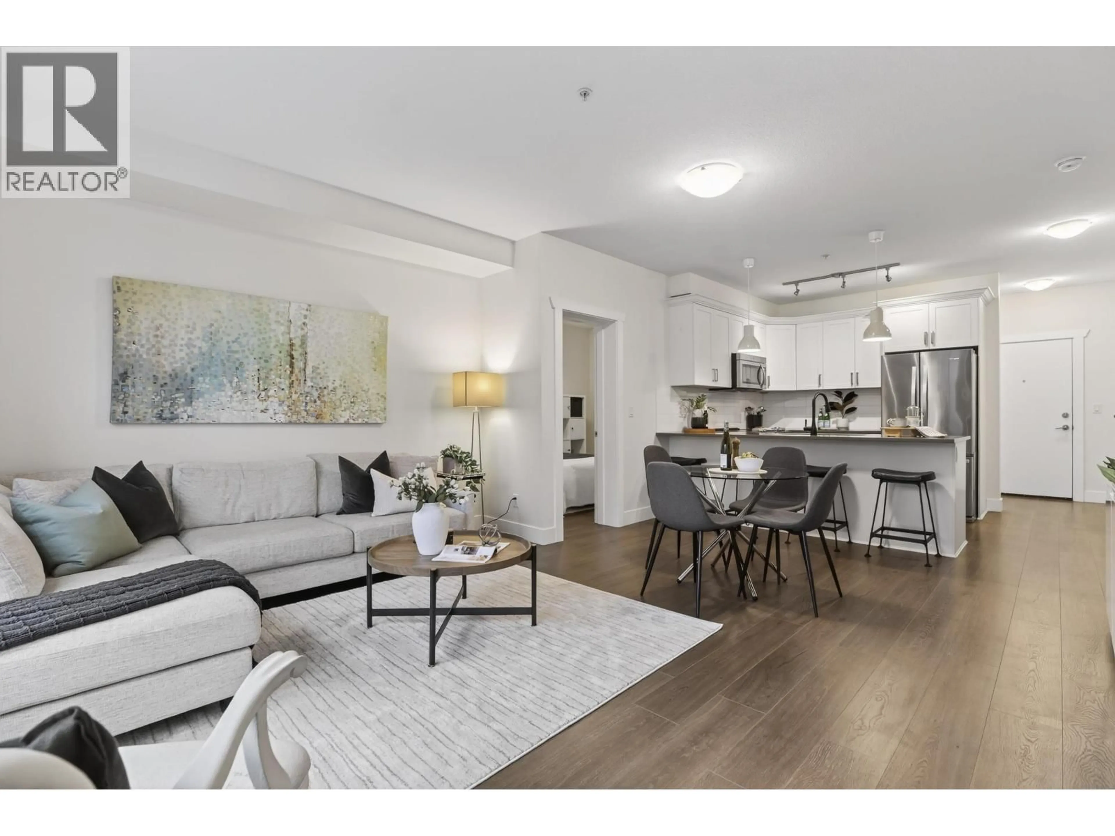 Living room with furniture, unknown for 202 - 2288 WELCHER AVENUE, Port Coquitlam British Columbia V3C1X3