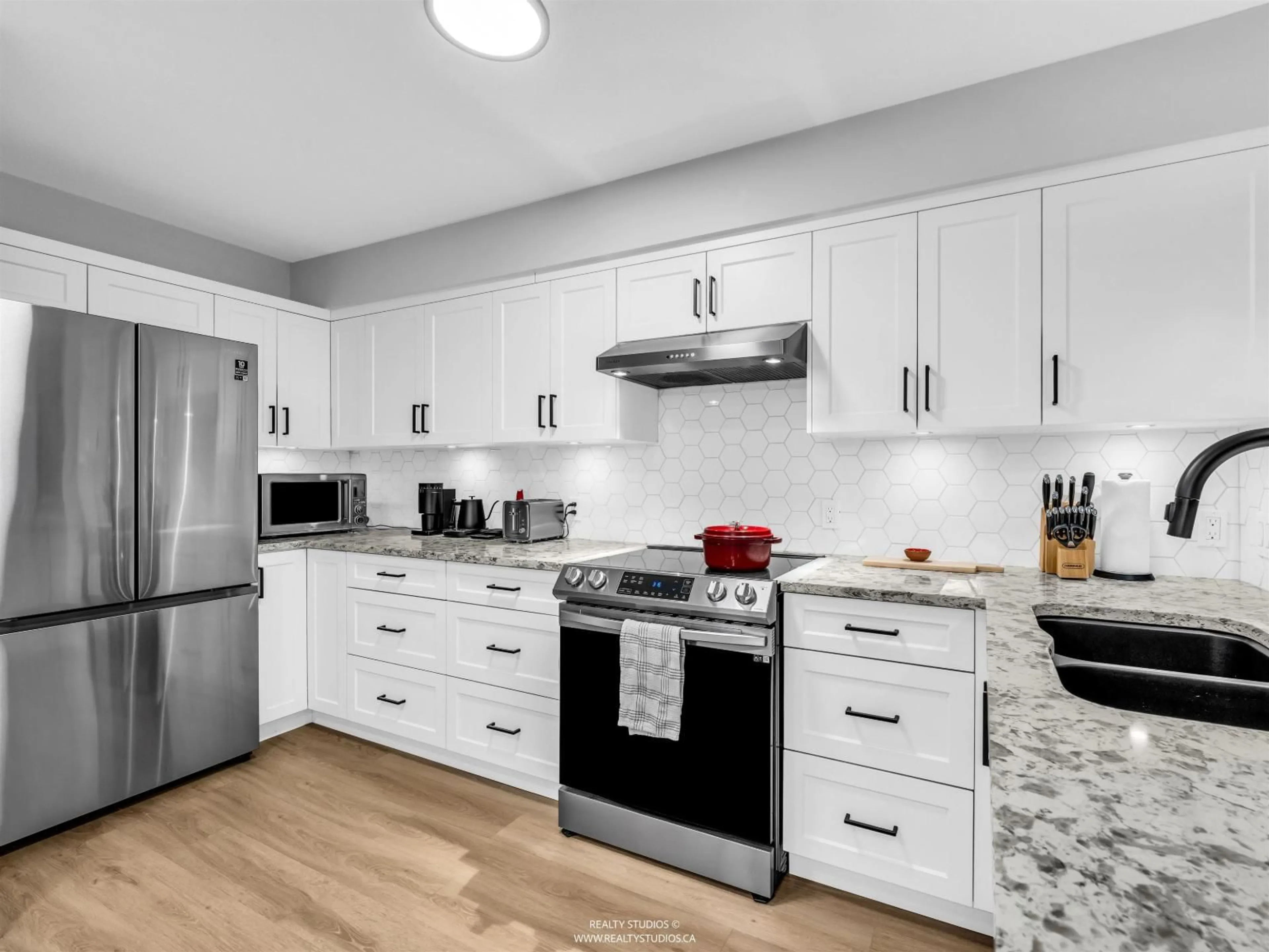 Open concept kitchen, unknown for 222 - 10866 CITY PARK WAY, Surrey British Columbia V3T5W9