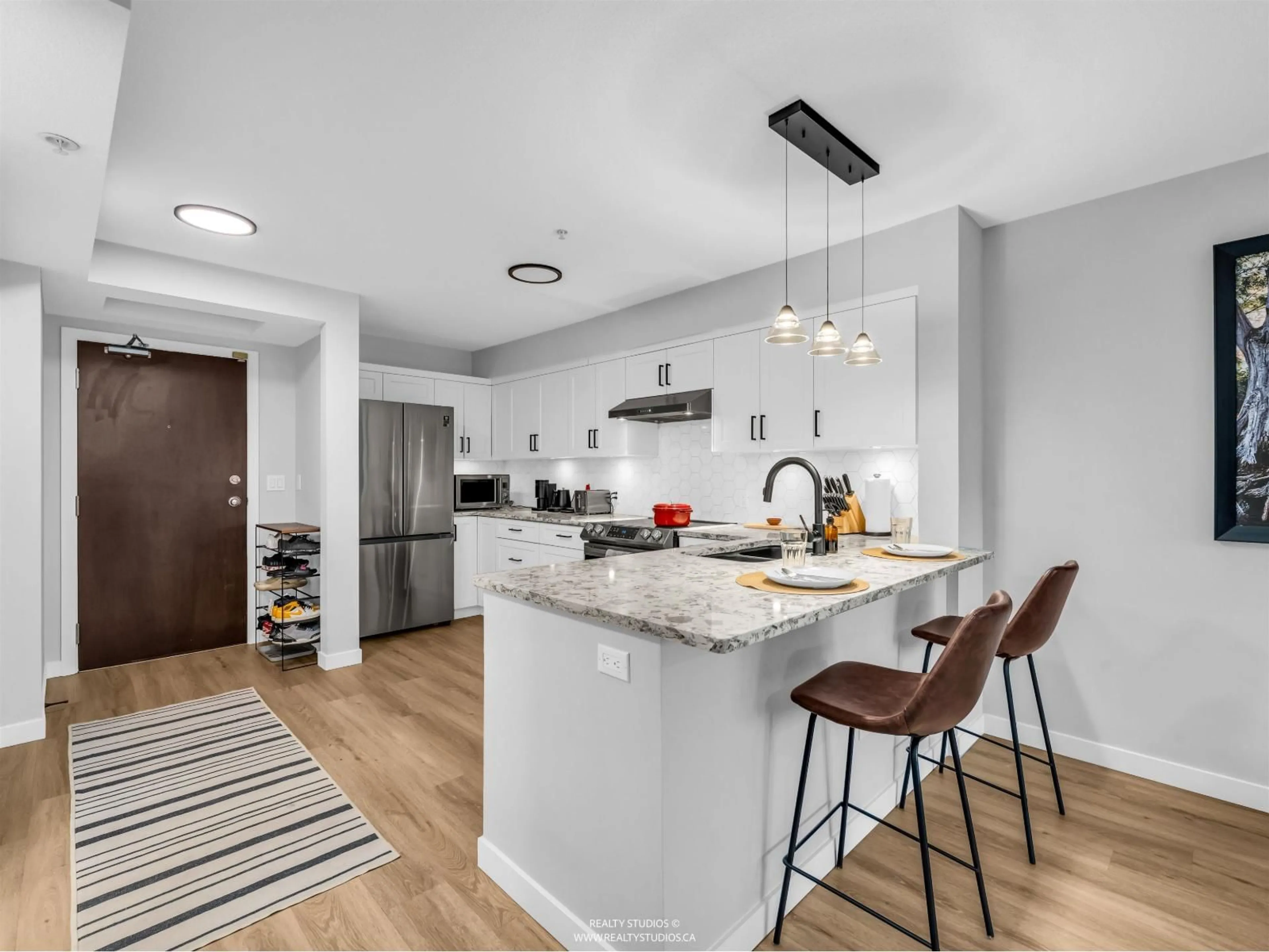 Open concept kitchen, unknown for 222 - 10866 CITY PARK WAY, Surrey British Columbia V3T5W9