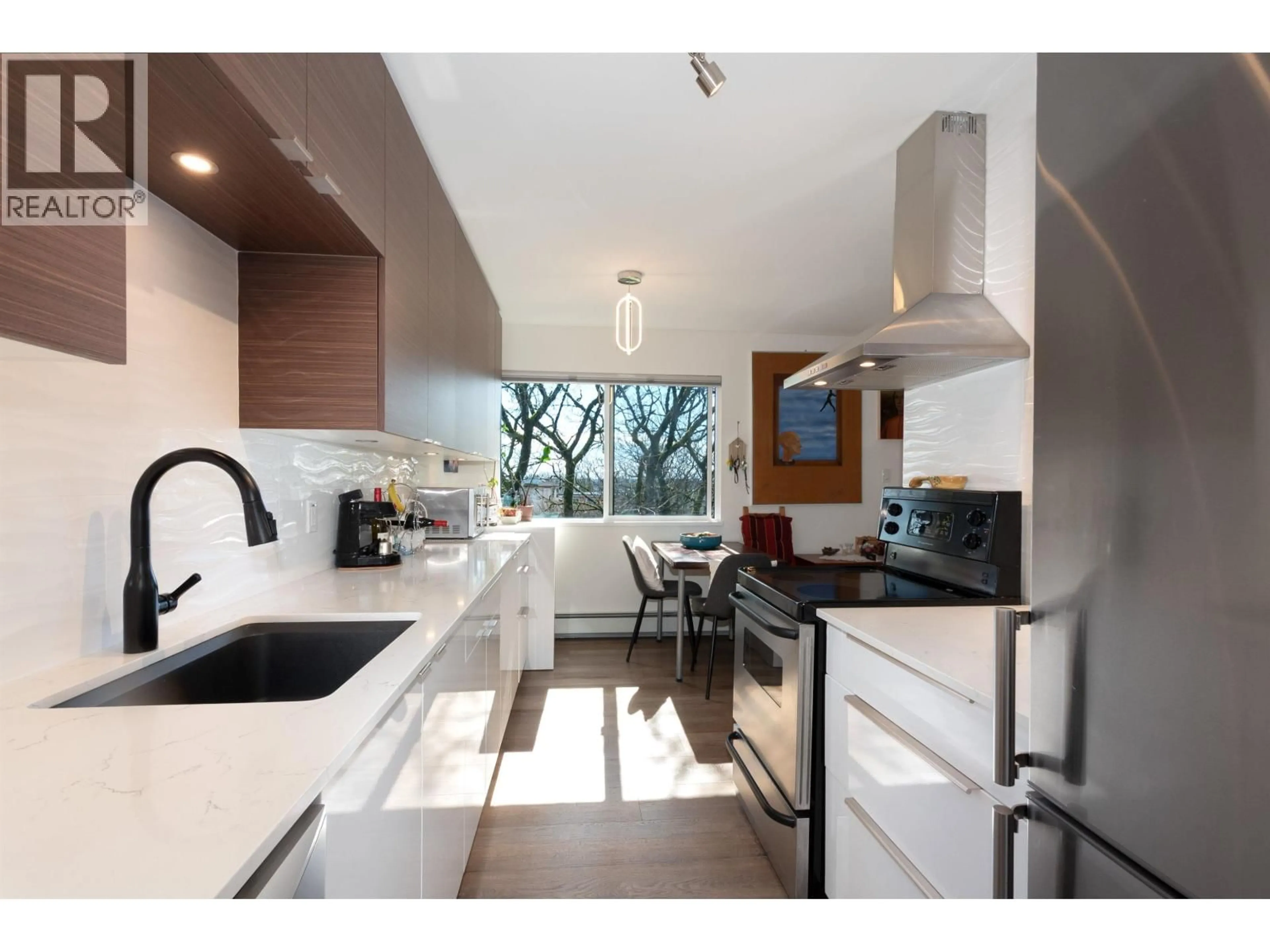 Contemporary kitchen, ceramic/tile floor for 405 - 8775 CARTIER STREET, Vancouver British Columbia V6P4V3