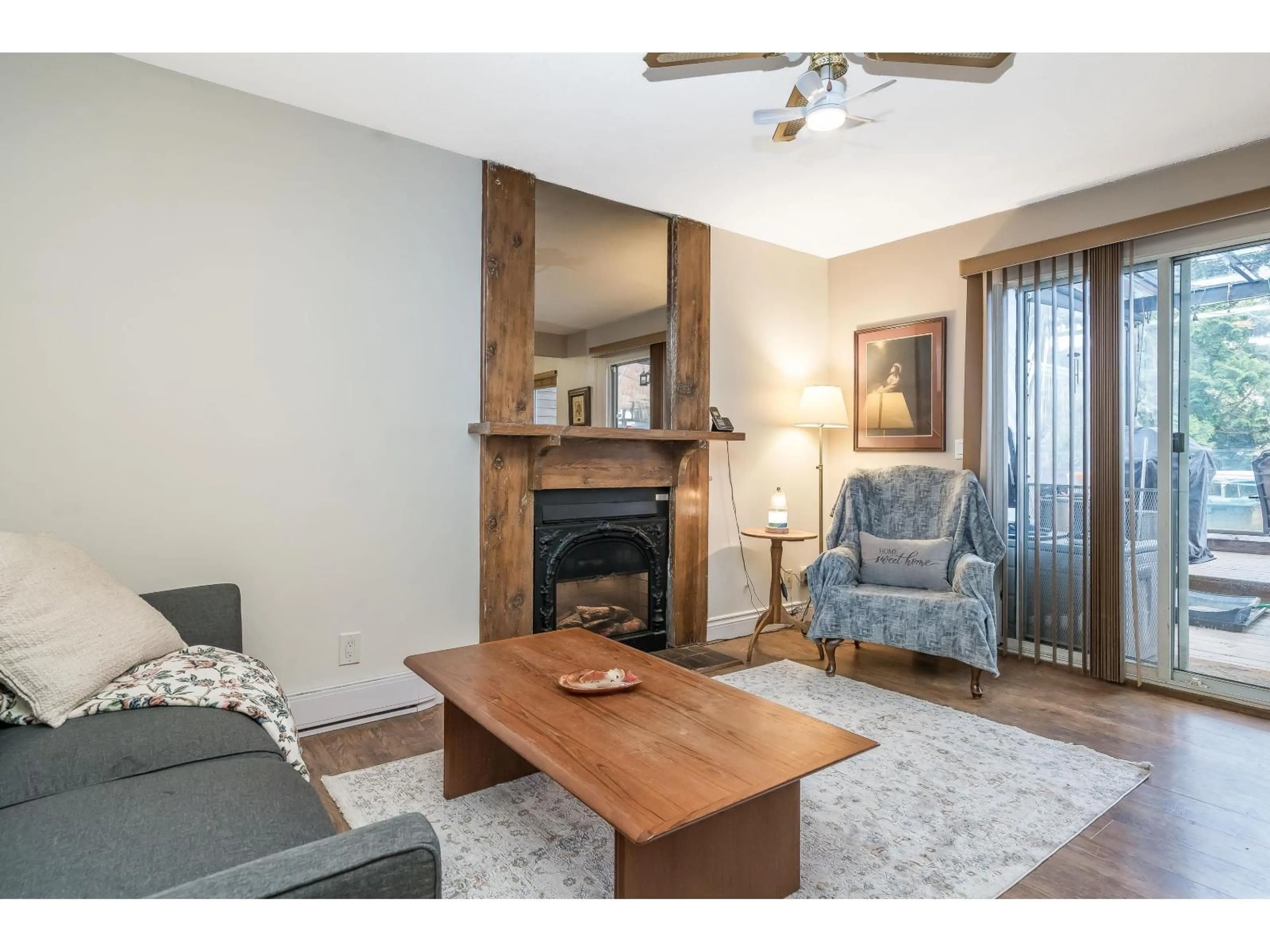 Living room with furniture, wood/laminate floor for 5350 199 STREET, Langley British Columbia V3A6T8