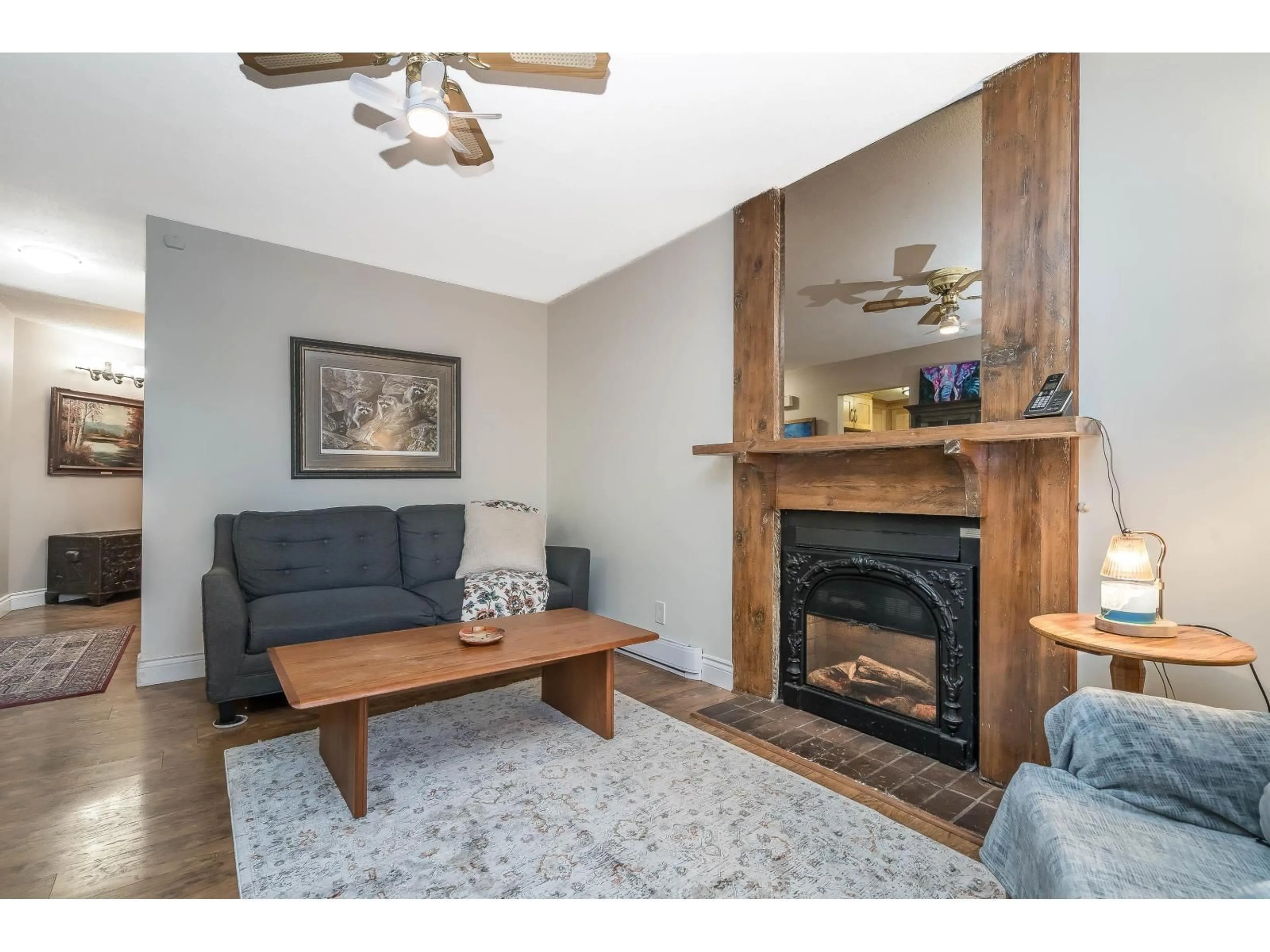Living room with furniture, wood/laminate floor for 5350 199 STREET, Langley British Columbia V3A6T8