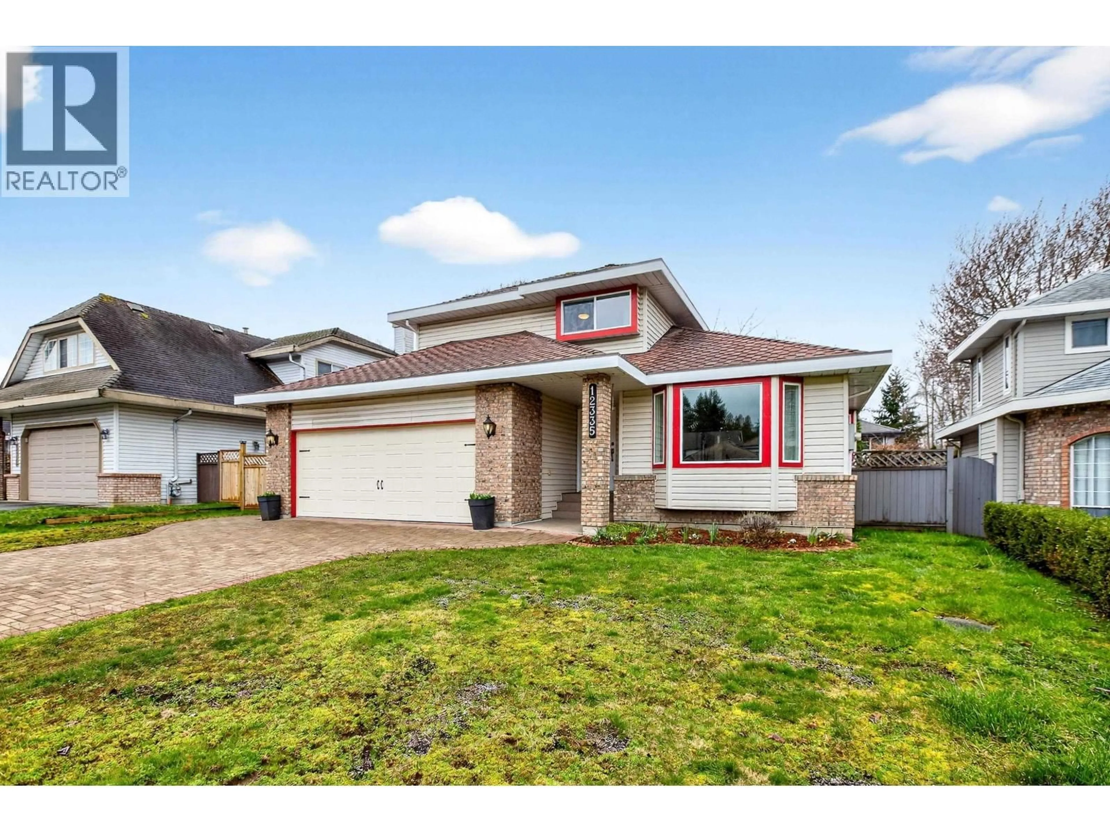 Home with vinyl exterior material, street for 12335 206 STREET, Maple Ridge British Columbia V2X0M6