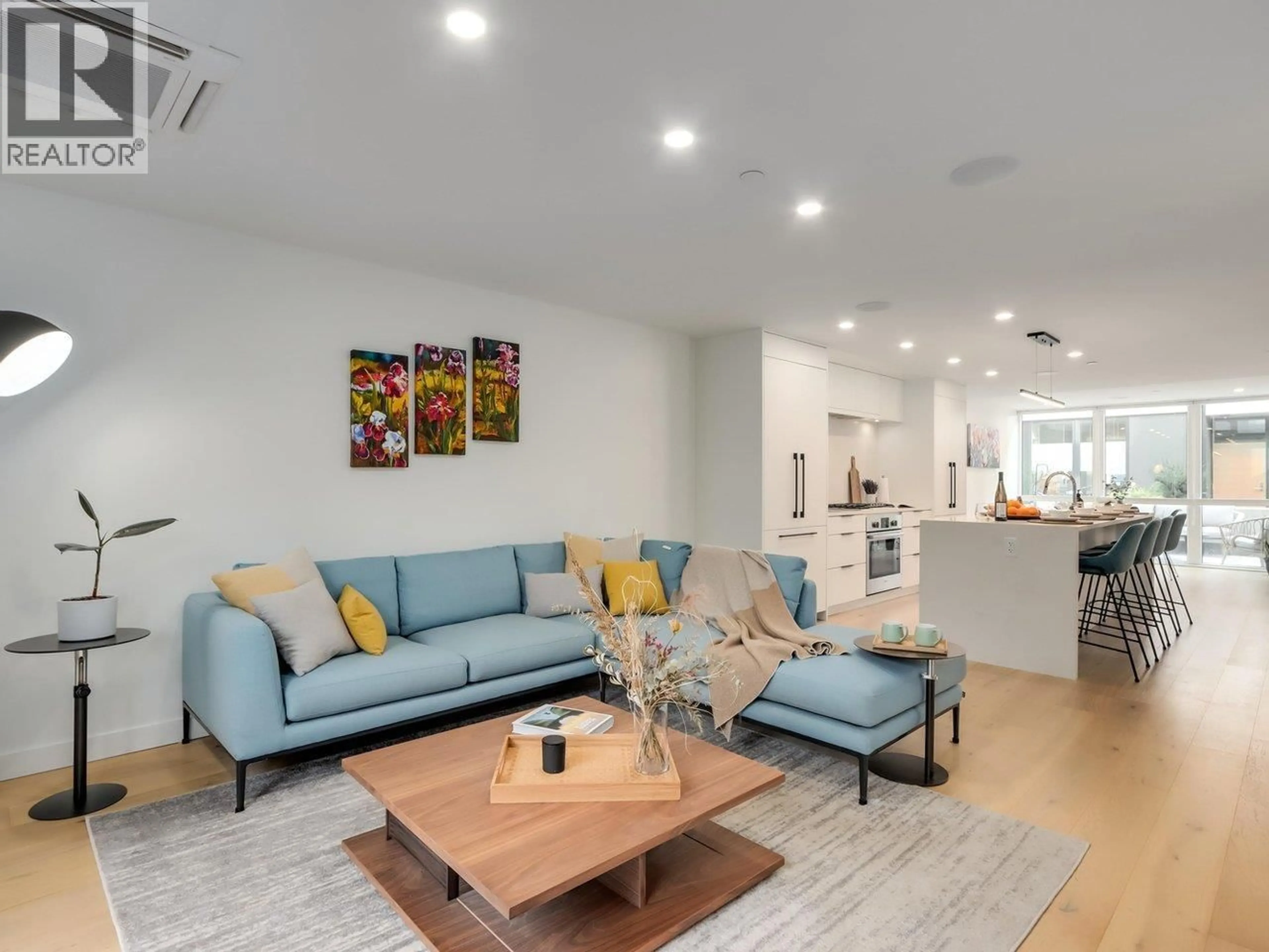 Living room with furniture, unknown for 102 - 649 3RD STREET, North Vancouver British Columbia V7L1G6