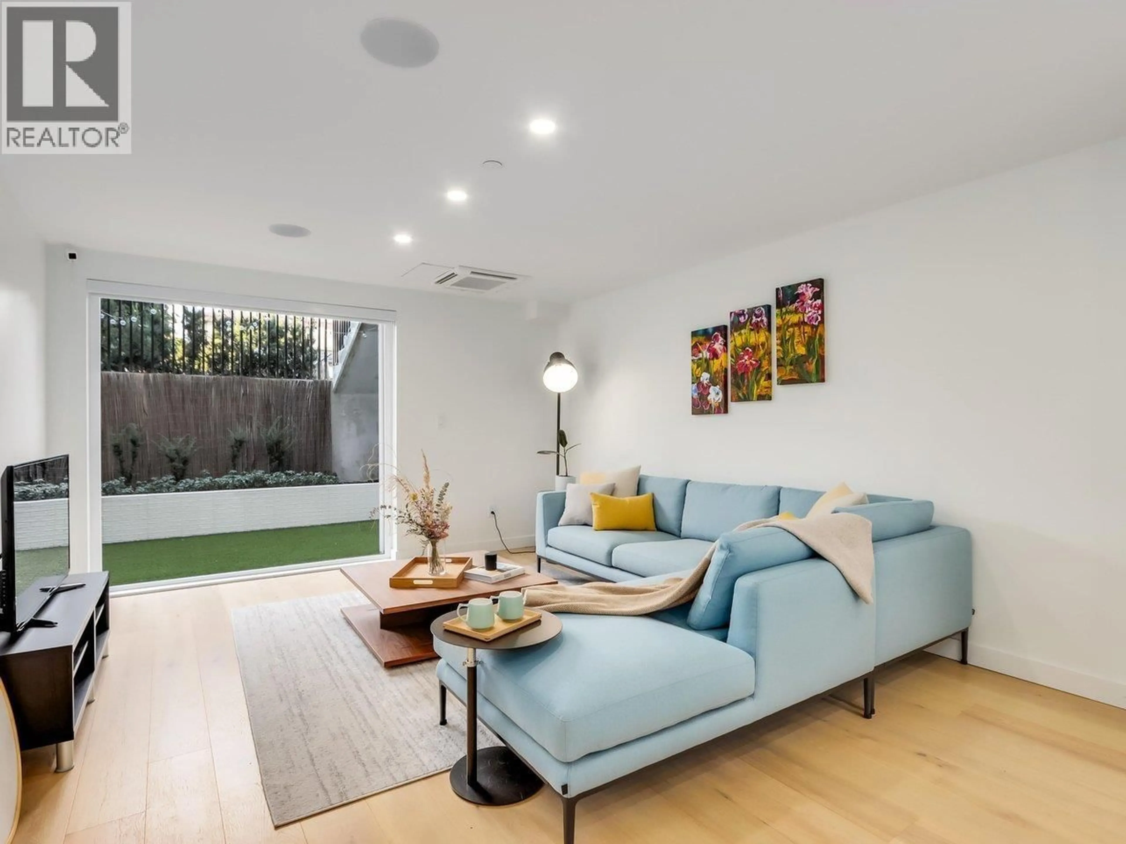 Living room with furniture, unknown for 102 - 649 3RD STREET, North Vancouver British Columbia V7L1G6