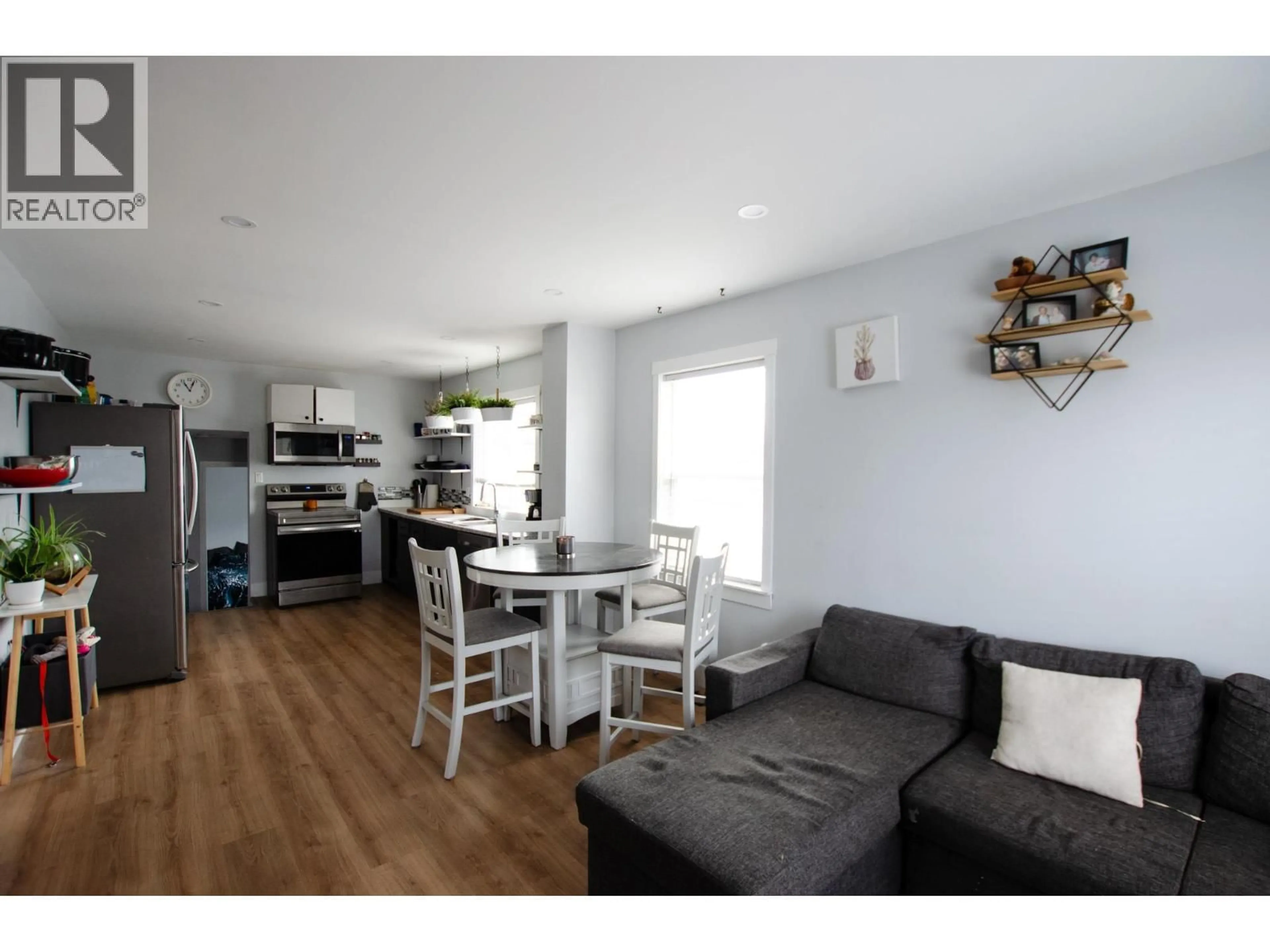Open concept kitchen, wood/laminate floor for 1904 UPLAND STREET, Prince George British Columbia V2L2V6