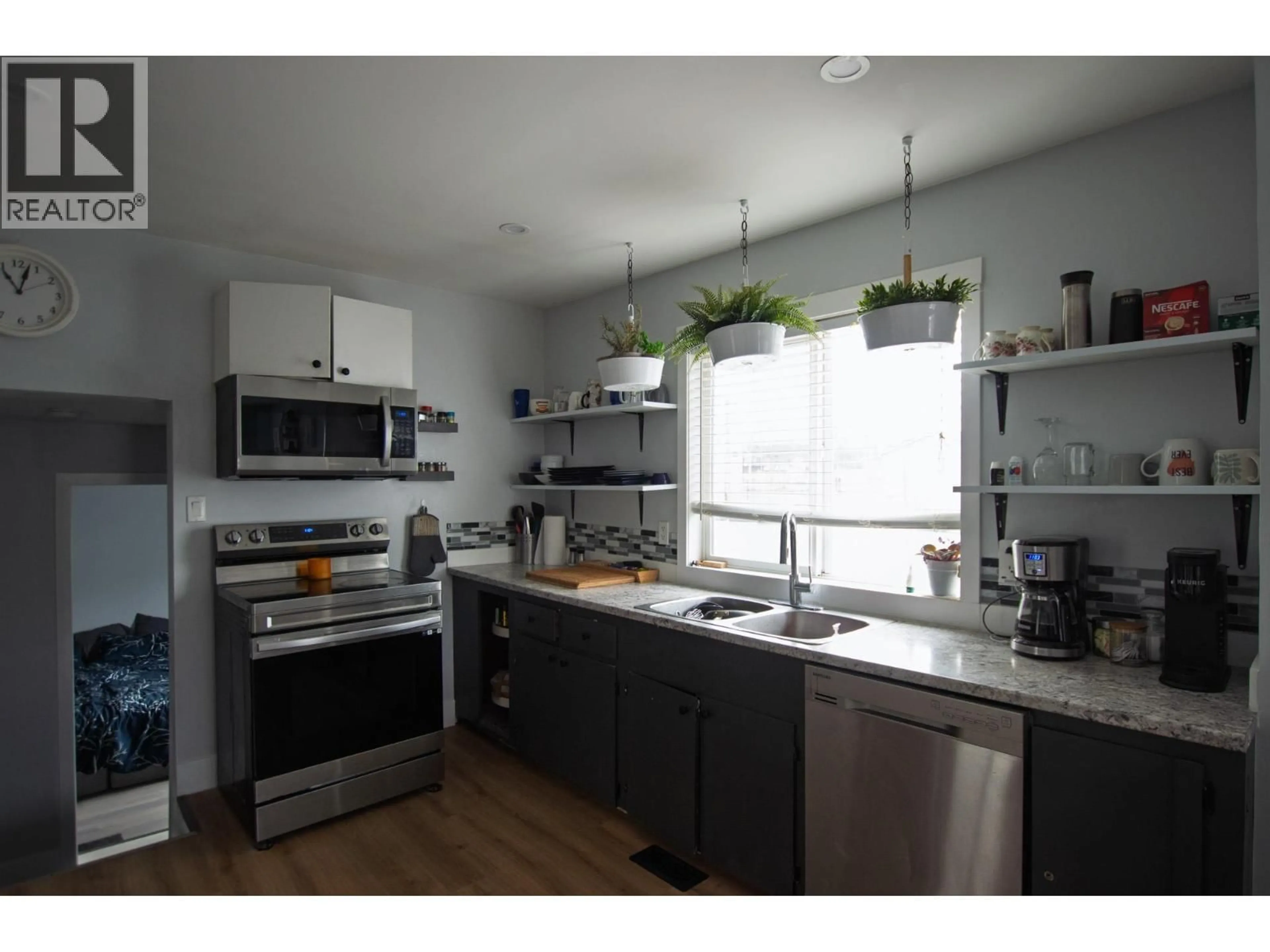 Open concept kitchen, unknown for 1904 UPLAND STREET, Prince George British Columbia V2L2V6
