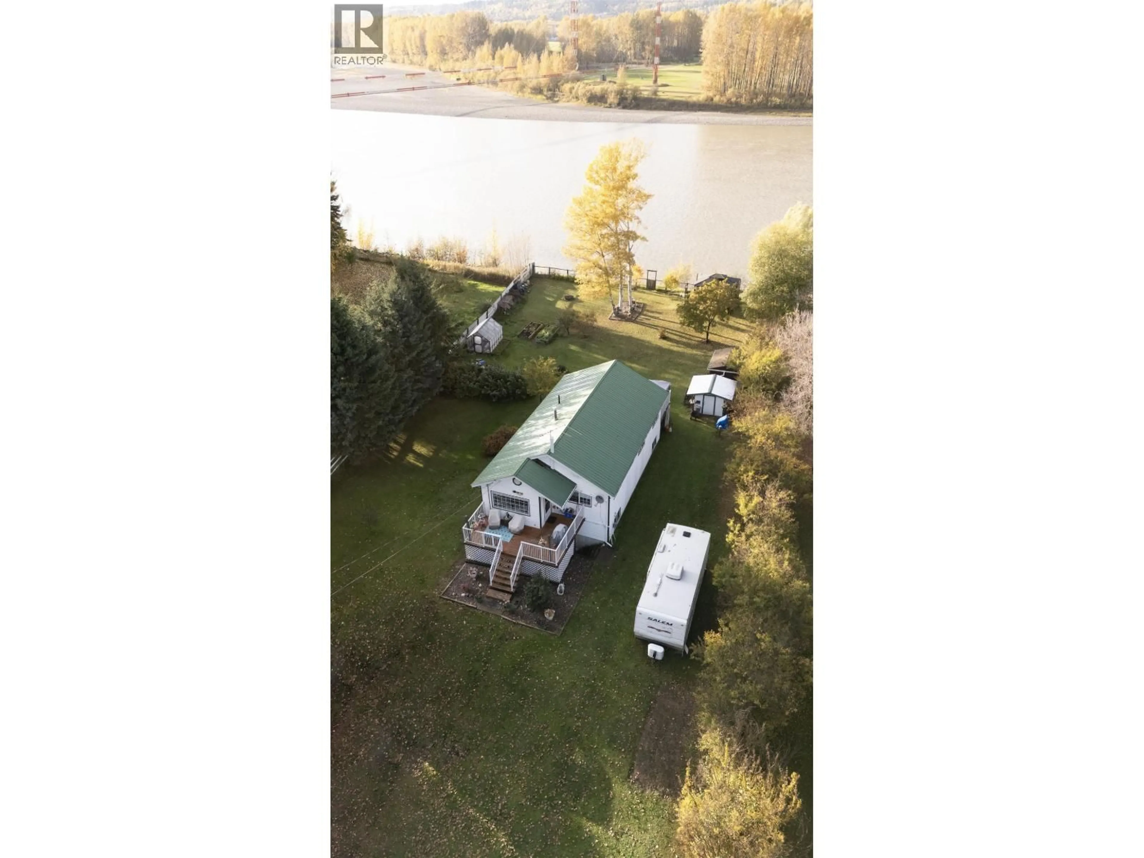 A pic from outside/outdoor area/front of a property/back of a property/a pic from drone, water/lake/river/ocean view for 7945 SHELLEY TOWNSITE ROAD, Prince George British Columbia V2K5X7