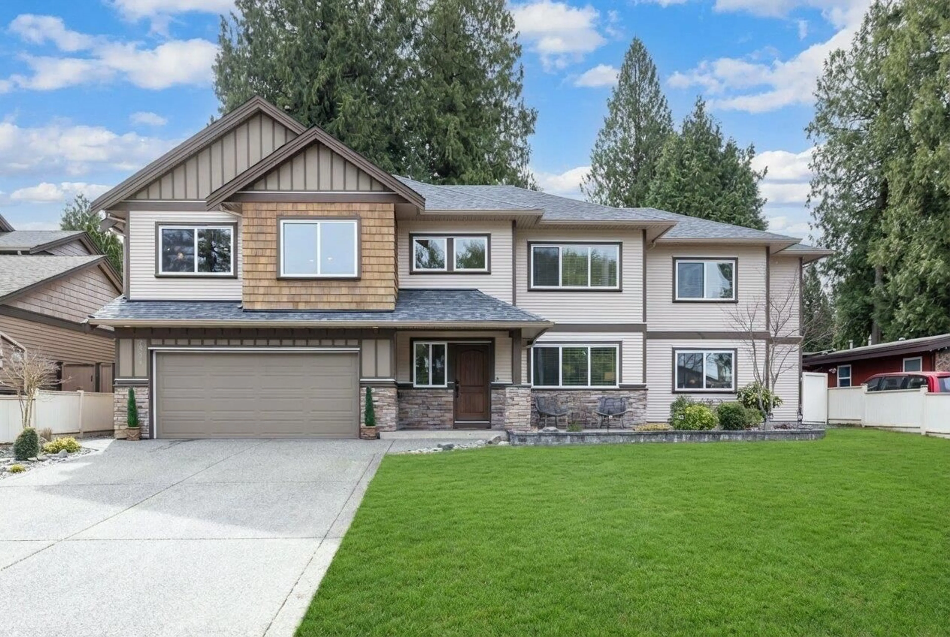 Home with vinyl exterior material, street for 20294 49A AVENUE, Langley British Columbia V3A3S3