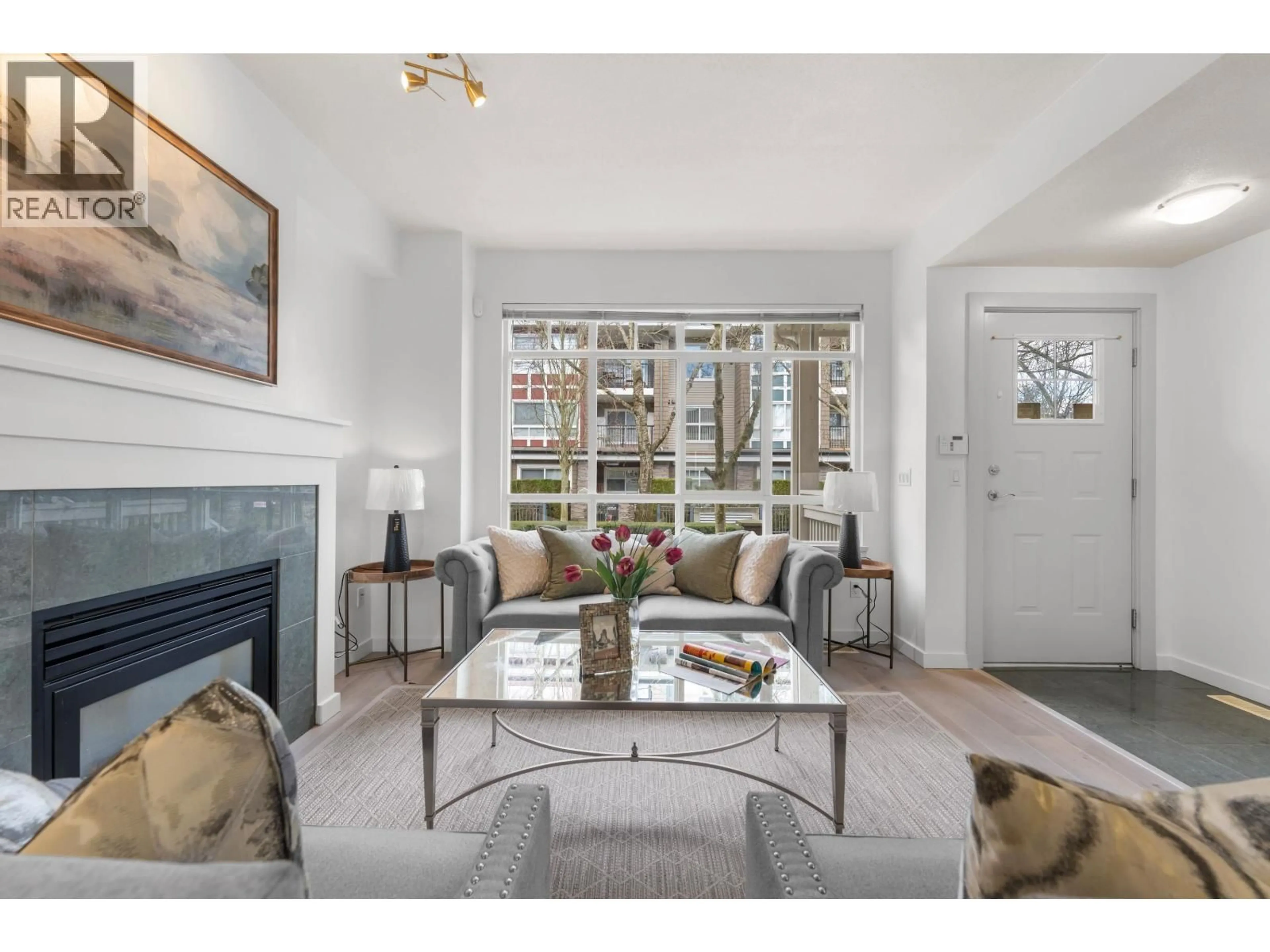 Living room with furniture, unknown for 7148 MONT ROYAL SQUARE, Vancouver British Columbia V5S4X5