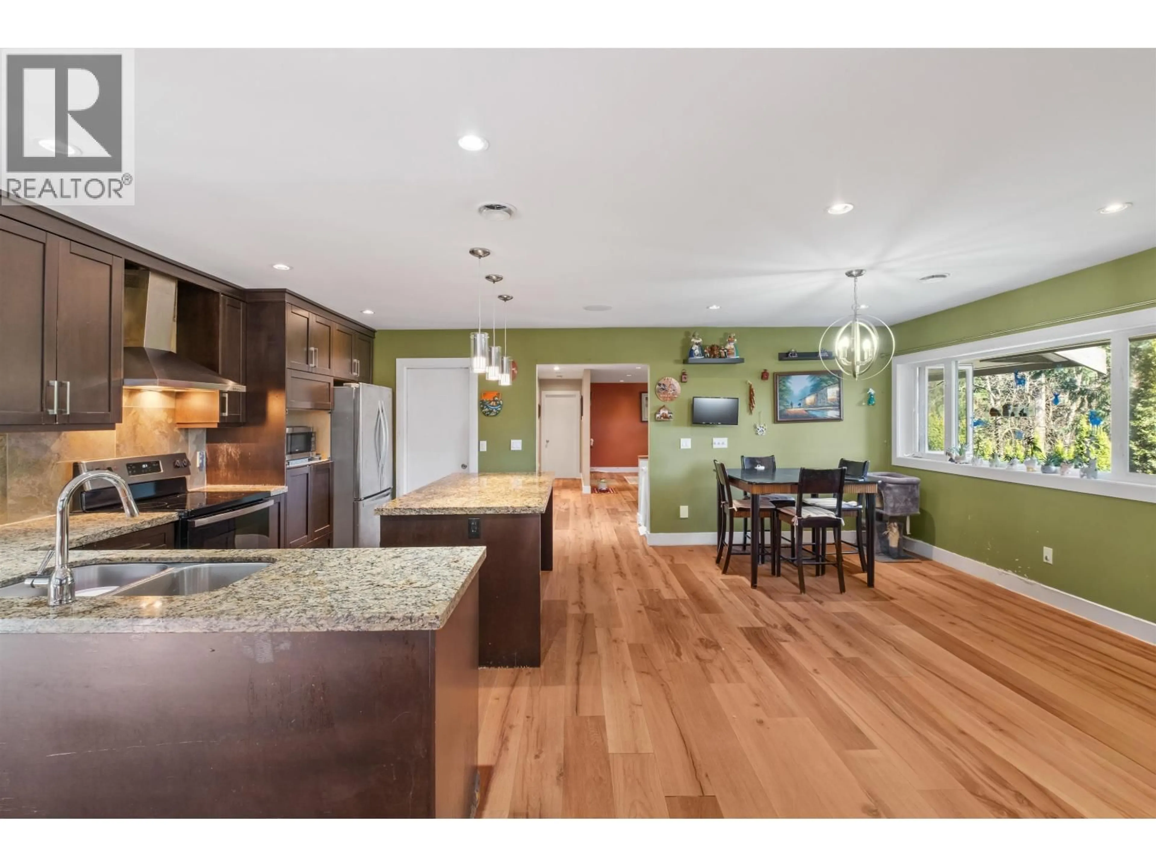 Open concept kitchen, wood/laminate floor for 1329 APPIN ROAD, North Vancouver British Columbia V7J2T4
