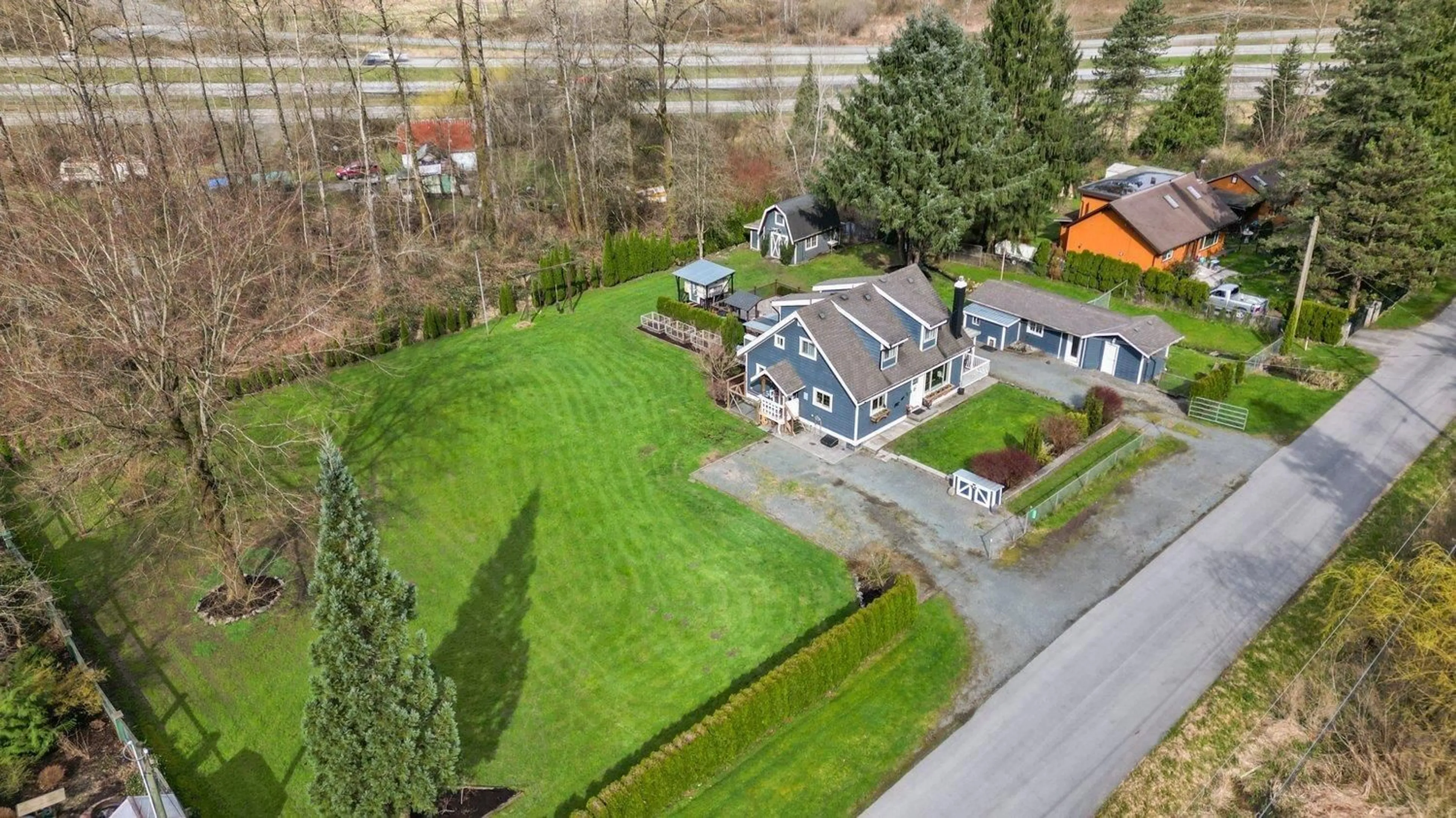 A pic from outside/outdoor area/front of a property/back of a property/a pic from drone, street for 10421 POPKUM ROAD, Rosedale British Columbia V0X1X1