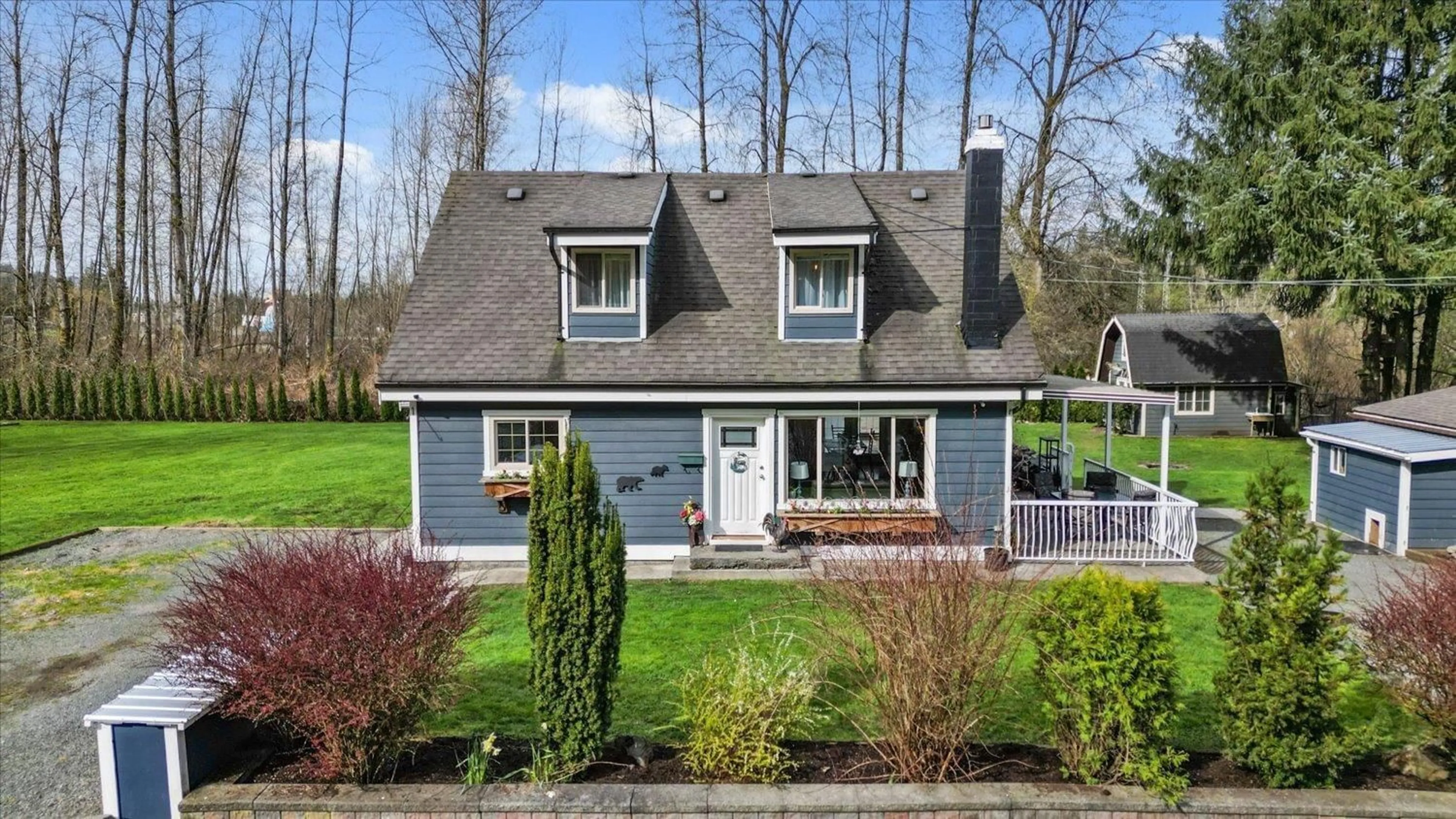 Home with vinyl exterior material, street for 10421 POPKUM ROAD, Rosedale British Columbia V0X1X1