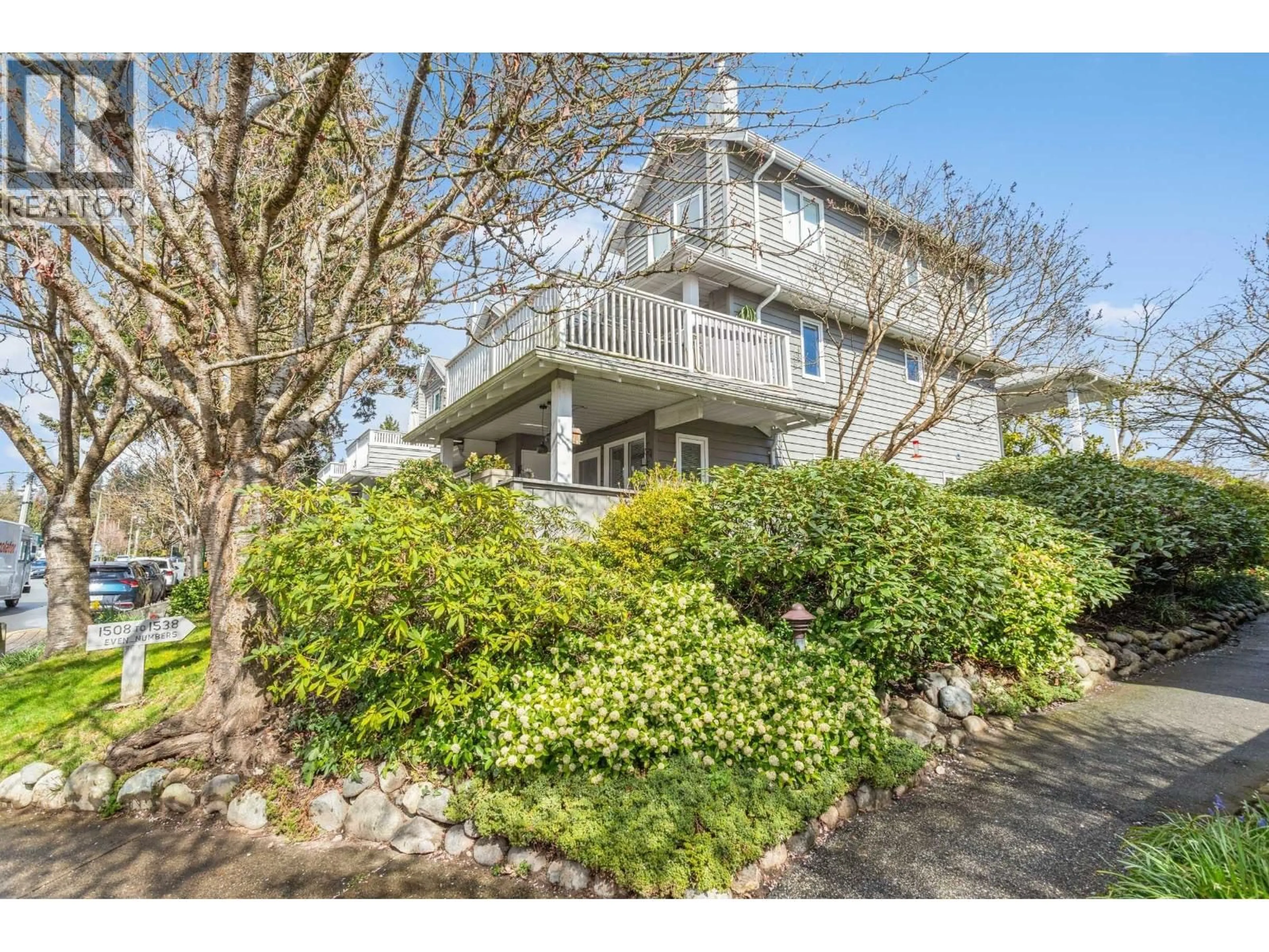 A pic from outside/outdoor area/front of a property/back of a property/a pic from drone, unknown for 205 - 1518 BOWSER AVENUE, North Vancouver British Columbia V7P2Y3