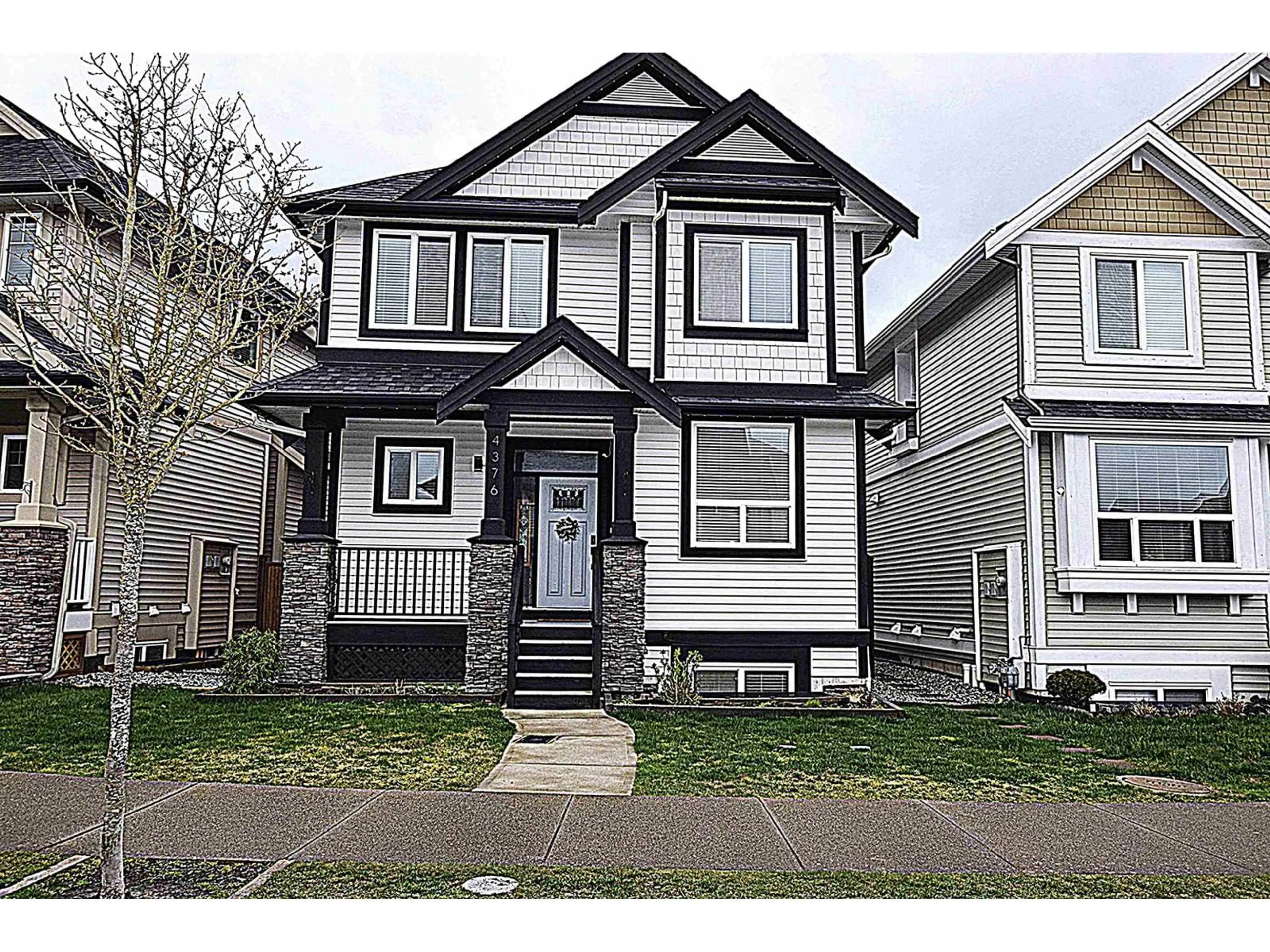 Home with vinyl exterior material, street for 4376 STEPHEN LEACOCK DRIVE, Abbotsford British Columbia V3G0G1