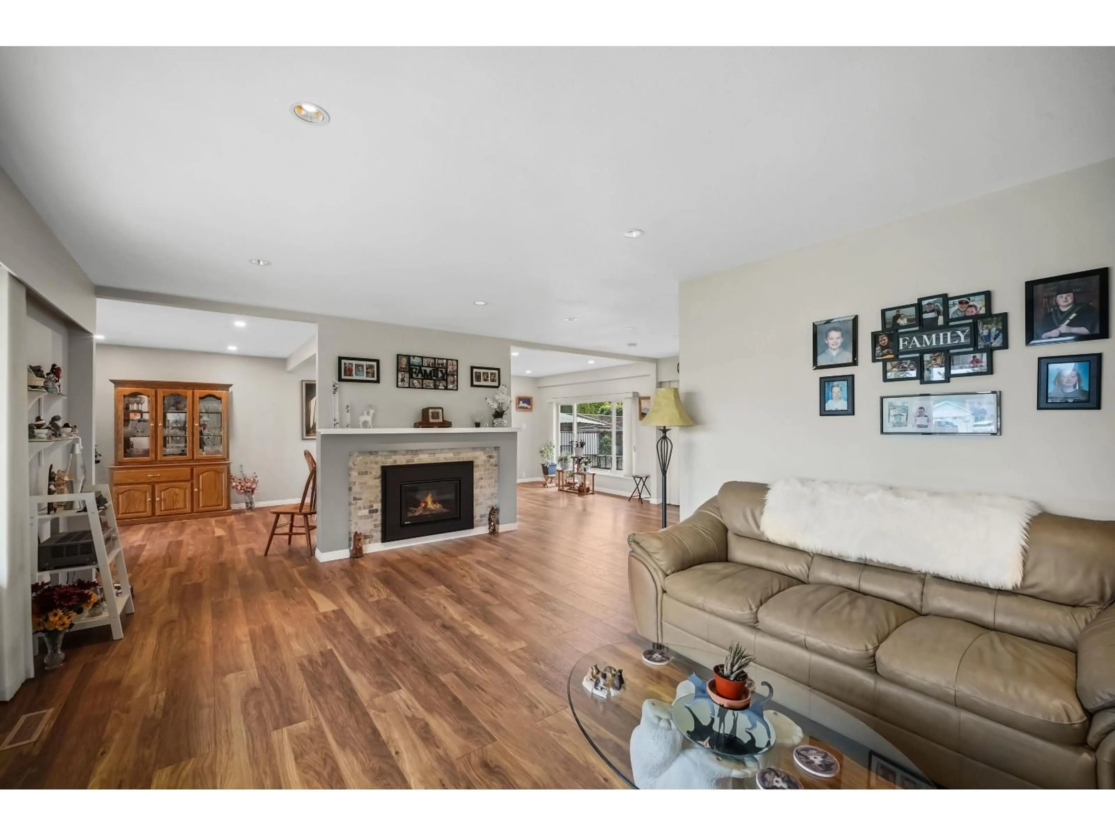 Living room with furniture, wood/laminate floor for 24322 46A AVENUE, Langley British Columbia V2Z2M3