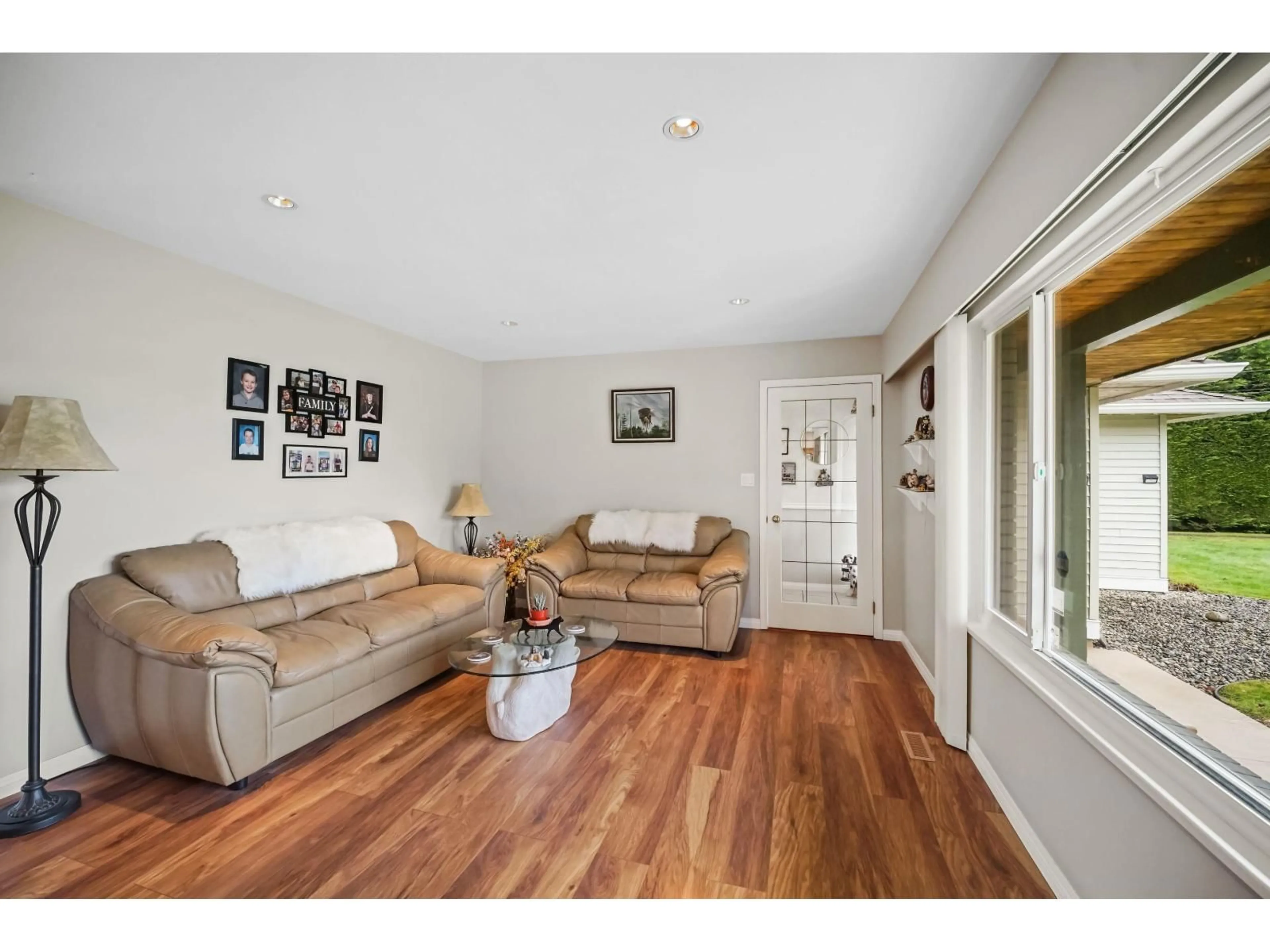 Living room with furniture, wood/laminate floor for 24322 46A AVENUE, Langley British Columbia V2Z2M3