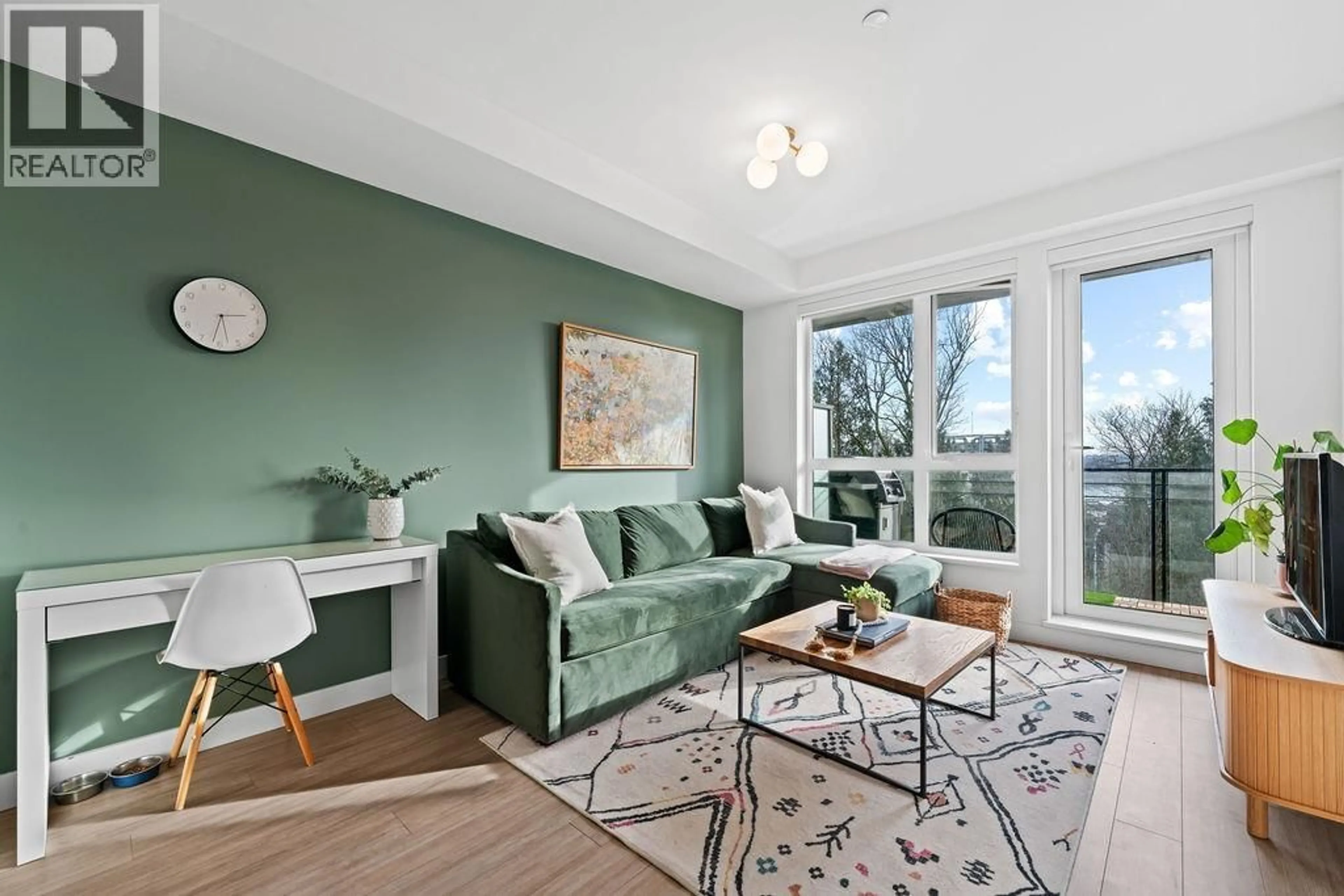 Living room with furniture, wood/laminate floor for 309 - 747 3RD STREET, North Vancouver British Columbia V7L1G8