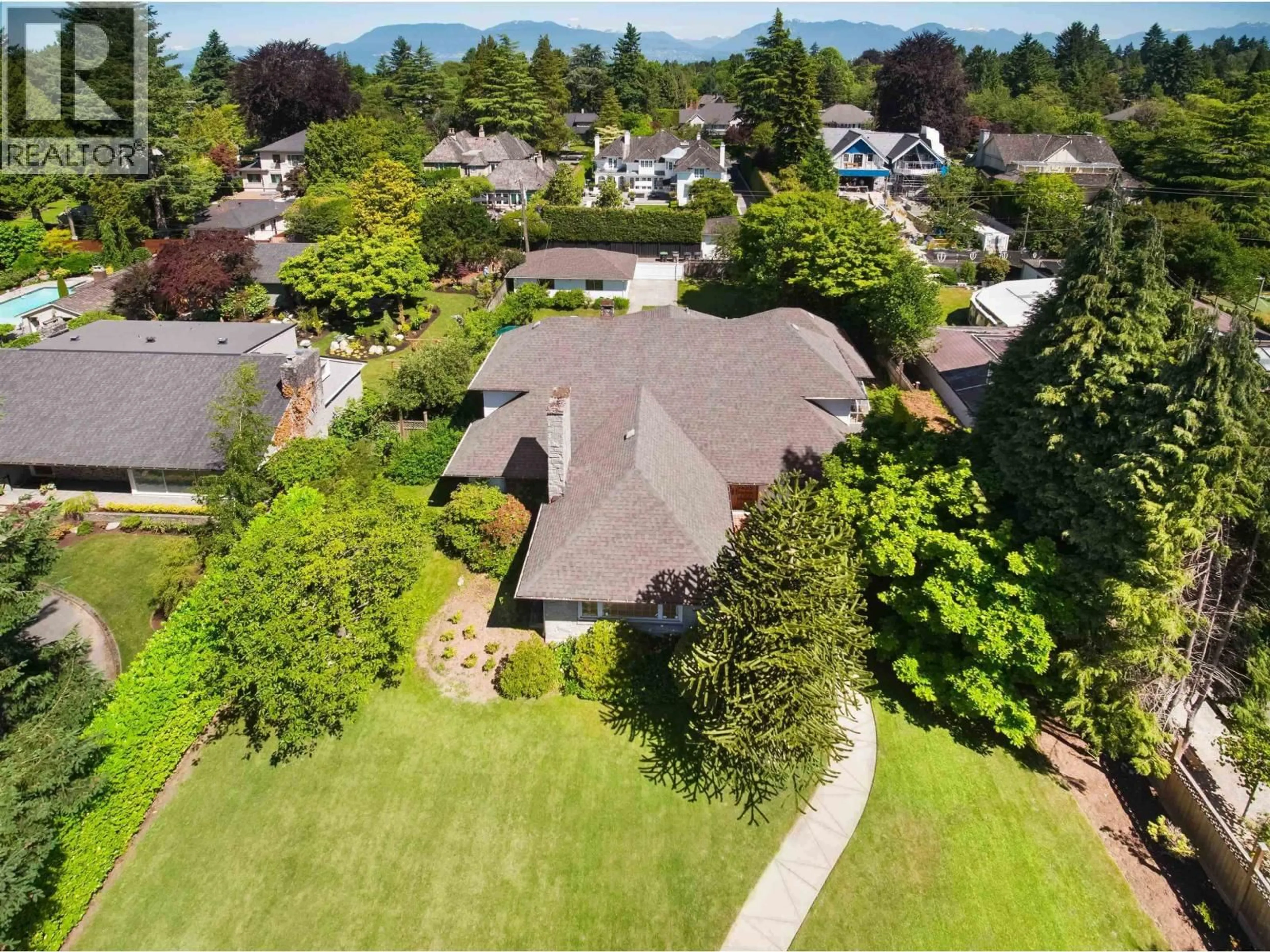 A pic from outside/outdoor area/front of a property/back of a property/a pic from drone, mountain view for 1655 41ST AVENUE, Vancouver British Columbia V6M1X9