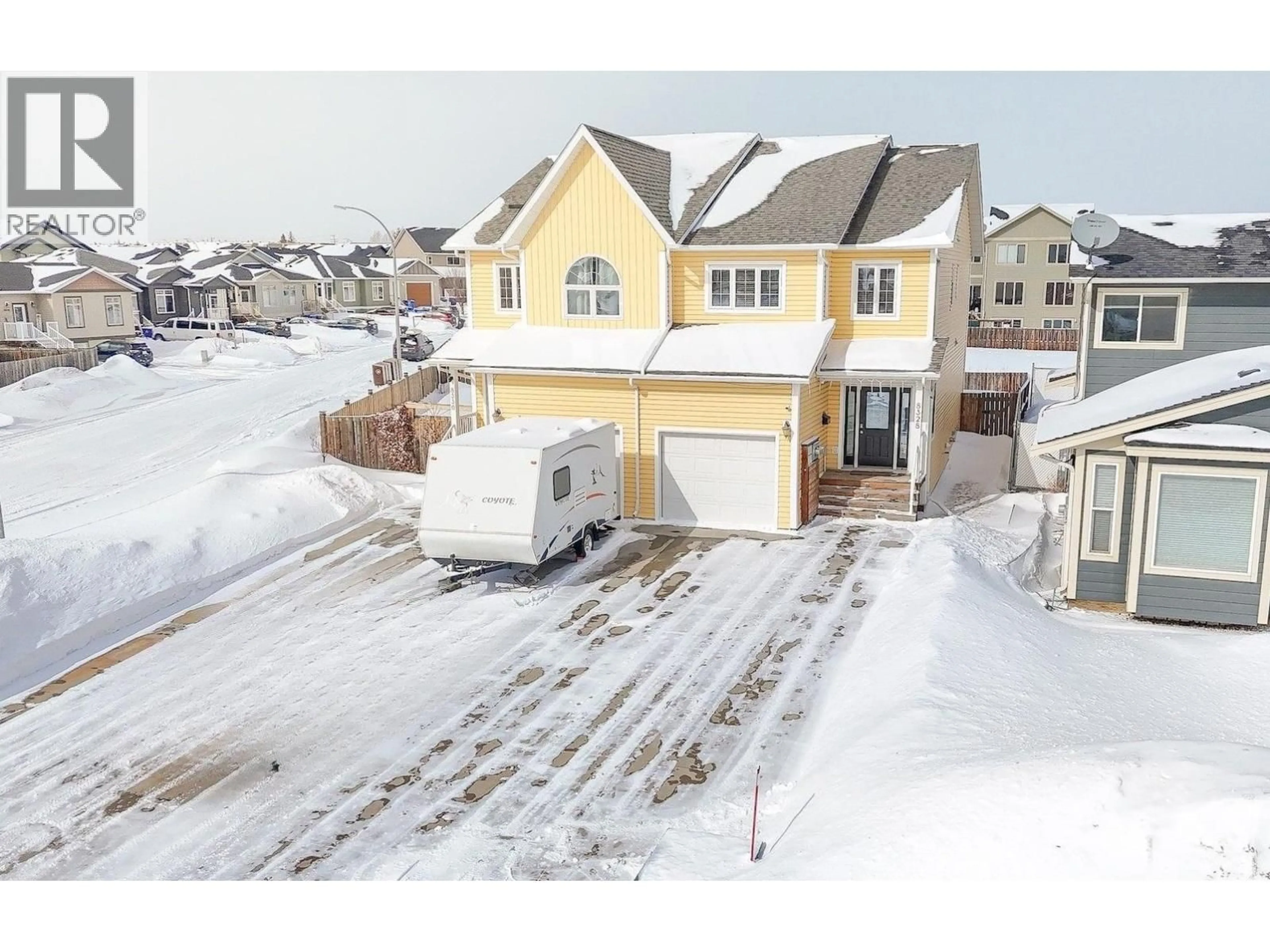 A pic from outside/outdoor area/front of a property/back of a property/a pic from drone, street for 8328 86 AVENUE, Fort St. John British Columbia V1J0G7