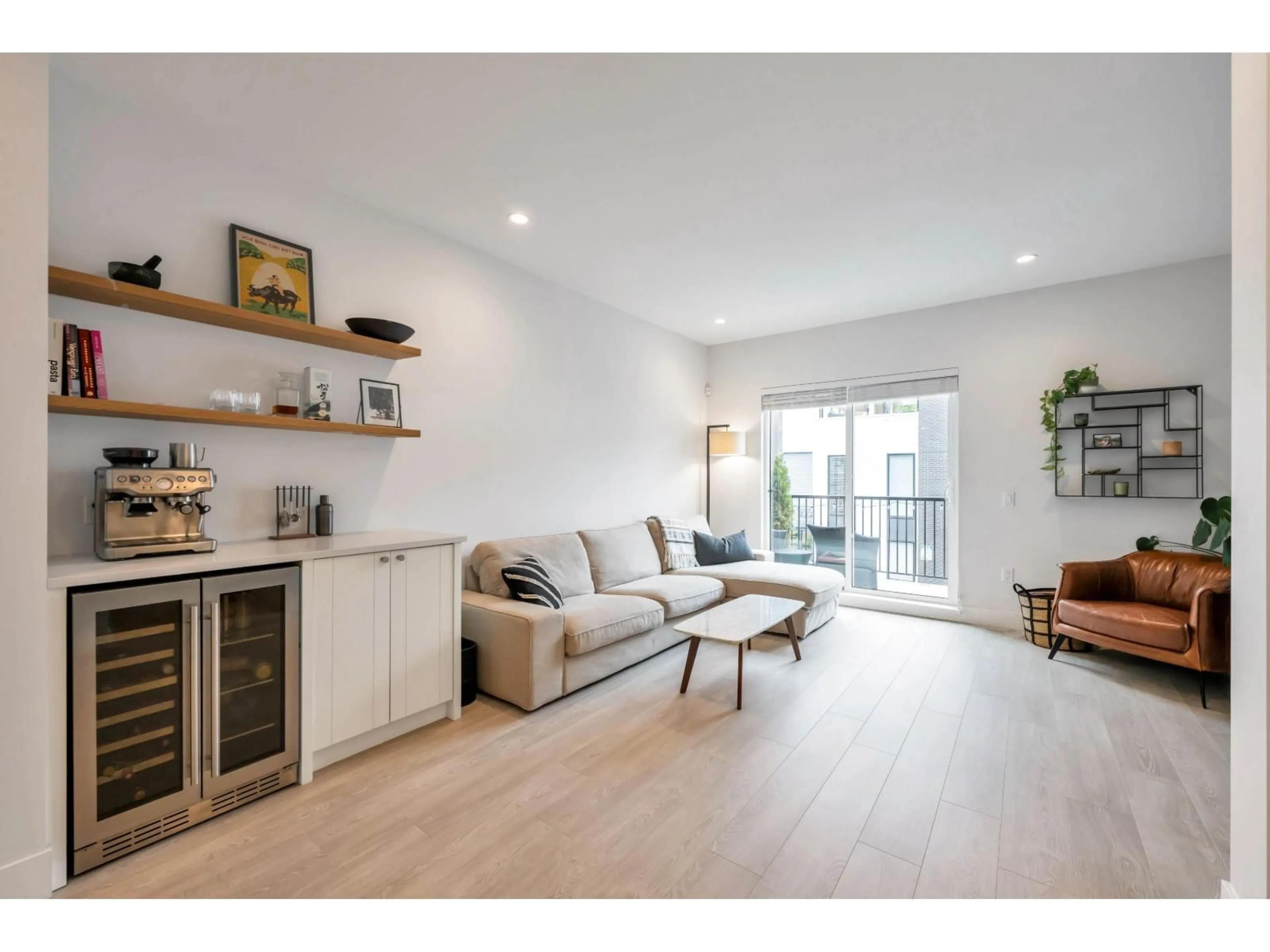 Living room with furniture, wood/laminate floor for 72 - 16685 25 AVENUE, Surrey British Columbia V3Z0Z4