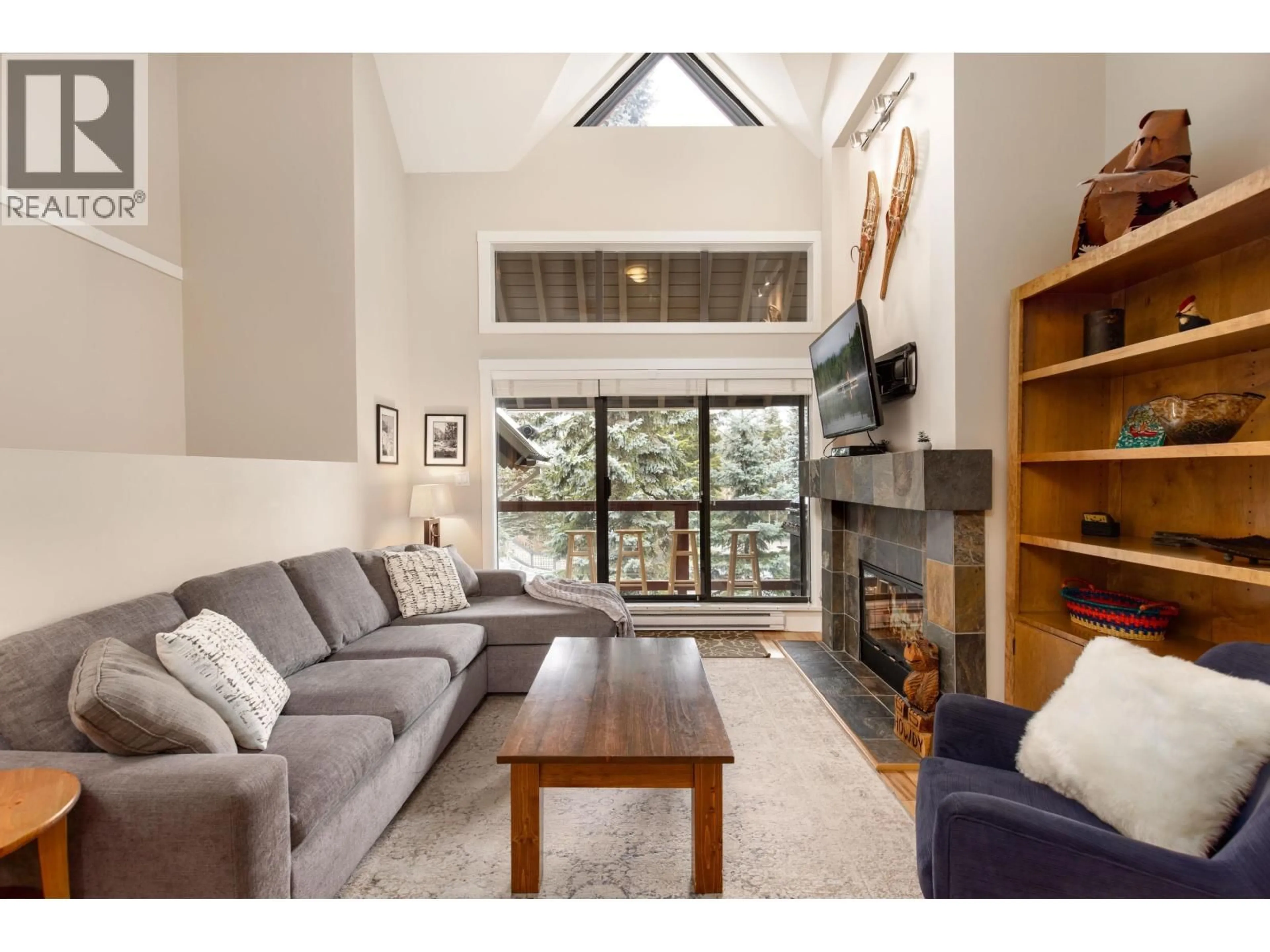 Living room with furniture, wood/laminate floor for 25 - 4637 BLACKCOMB WAY, Whistler British Columbia V8E0Y6