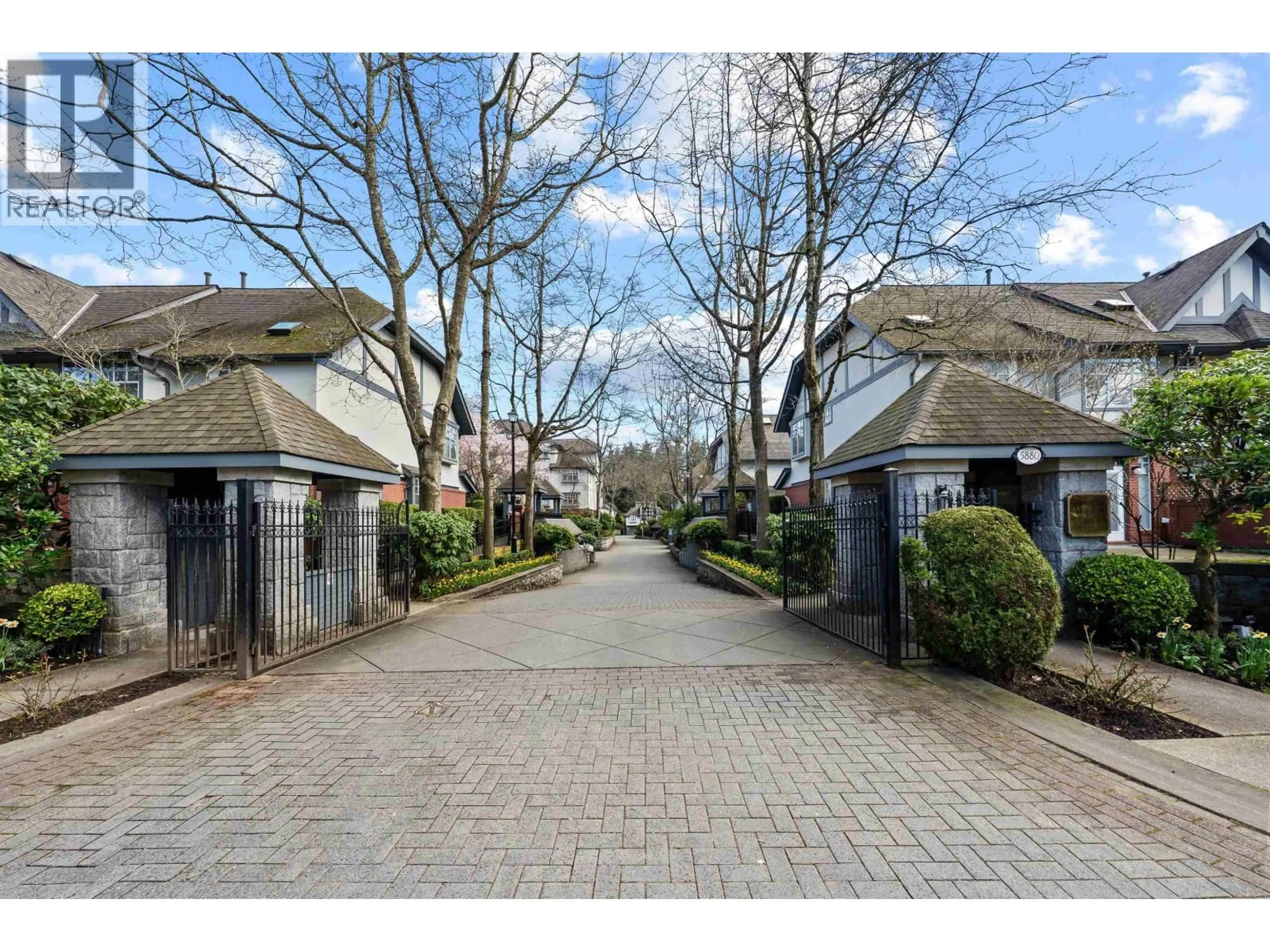 A pic from outside/outdoor area/front of a property/back of a property/a pic from drone, street for 12 - 5880 HAMPTON PLACE, Vancouver British Columbia V6T2E9