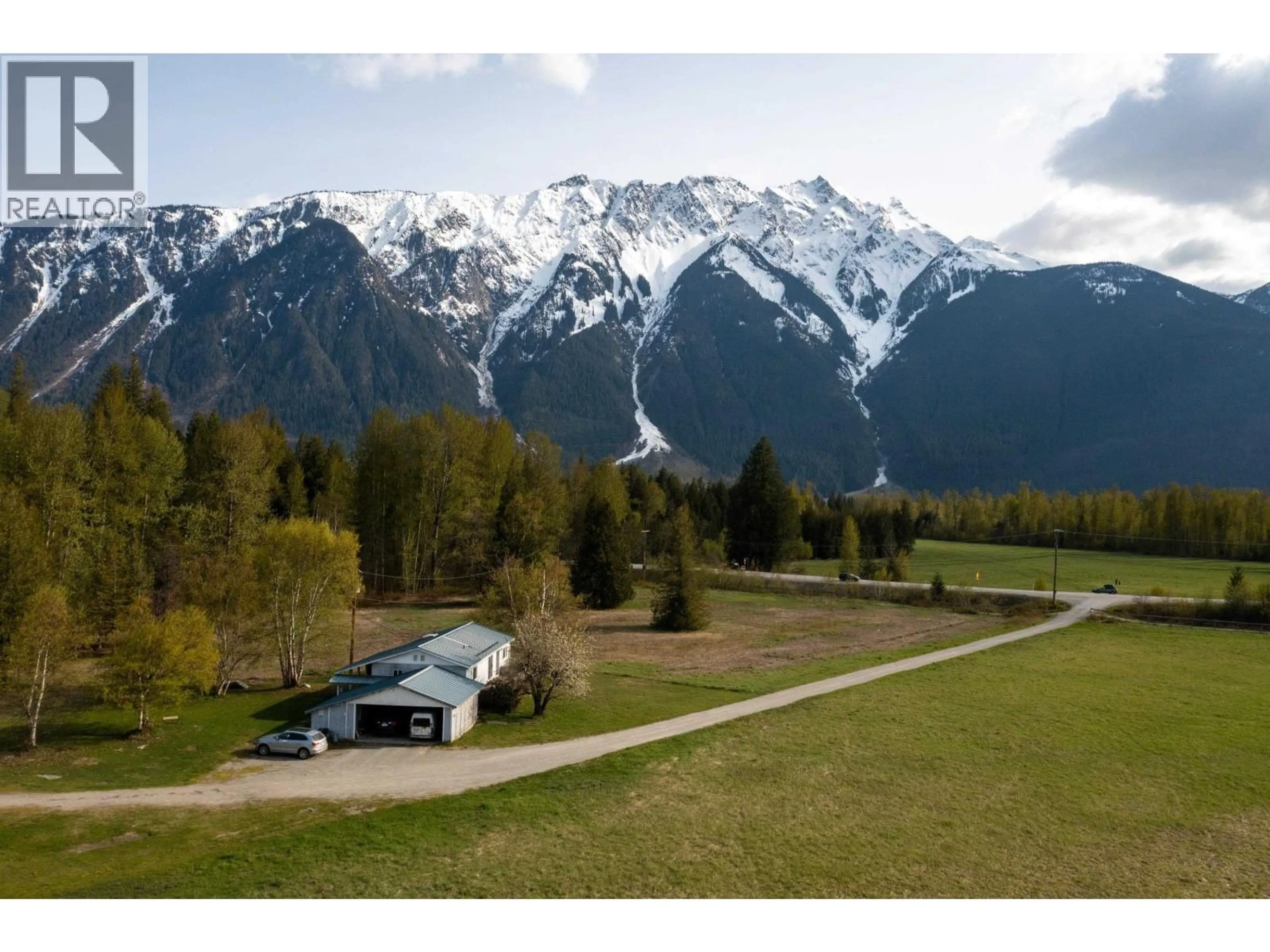 A pic from outside/outdoor area/front of a property/back of a property/a pic from drone, mountain view for 1691 HIGHWAY 99, Pemberton British Columbia V0N2L0