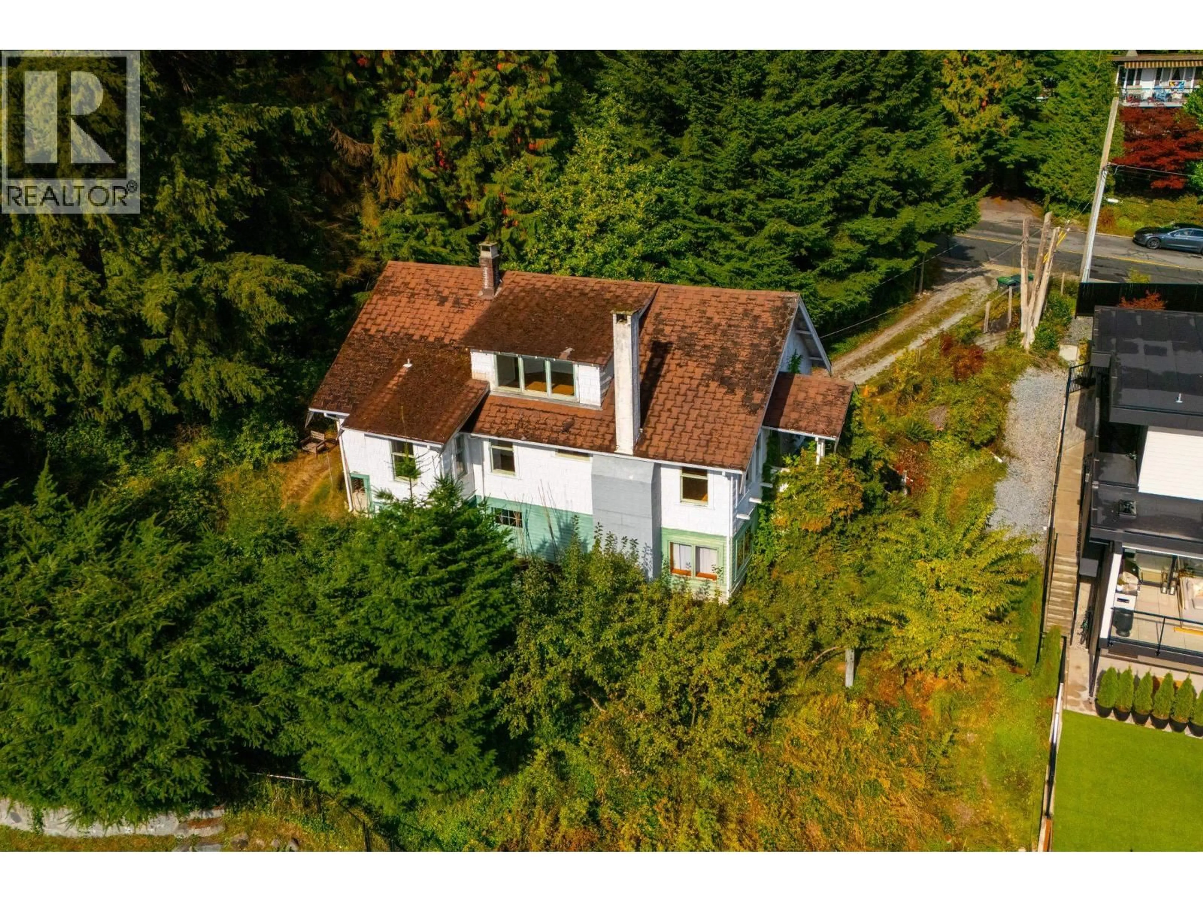 A pic from outside/outdoor area/front of a property/back of a property/a pic from drone, unknown for 1195 DEMPSEY ROAD, North Vancouver British Columbia V7K1S4