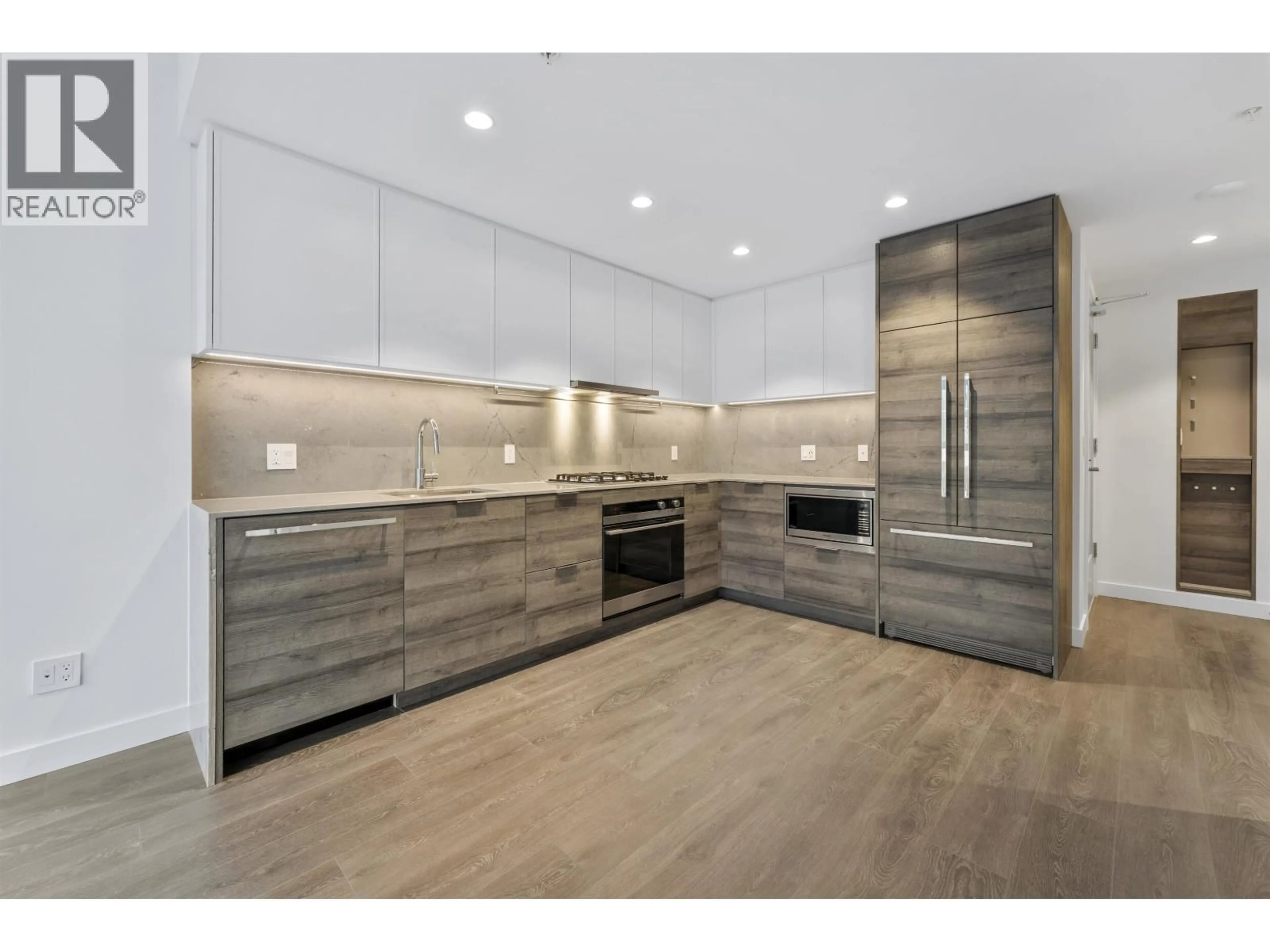 Open concept kitchen, wood/laminate floor for 501 - 1045 AUSTIN AVENUE, Coquitlam British Columbia V3K0G9