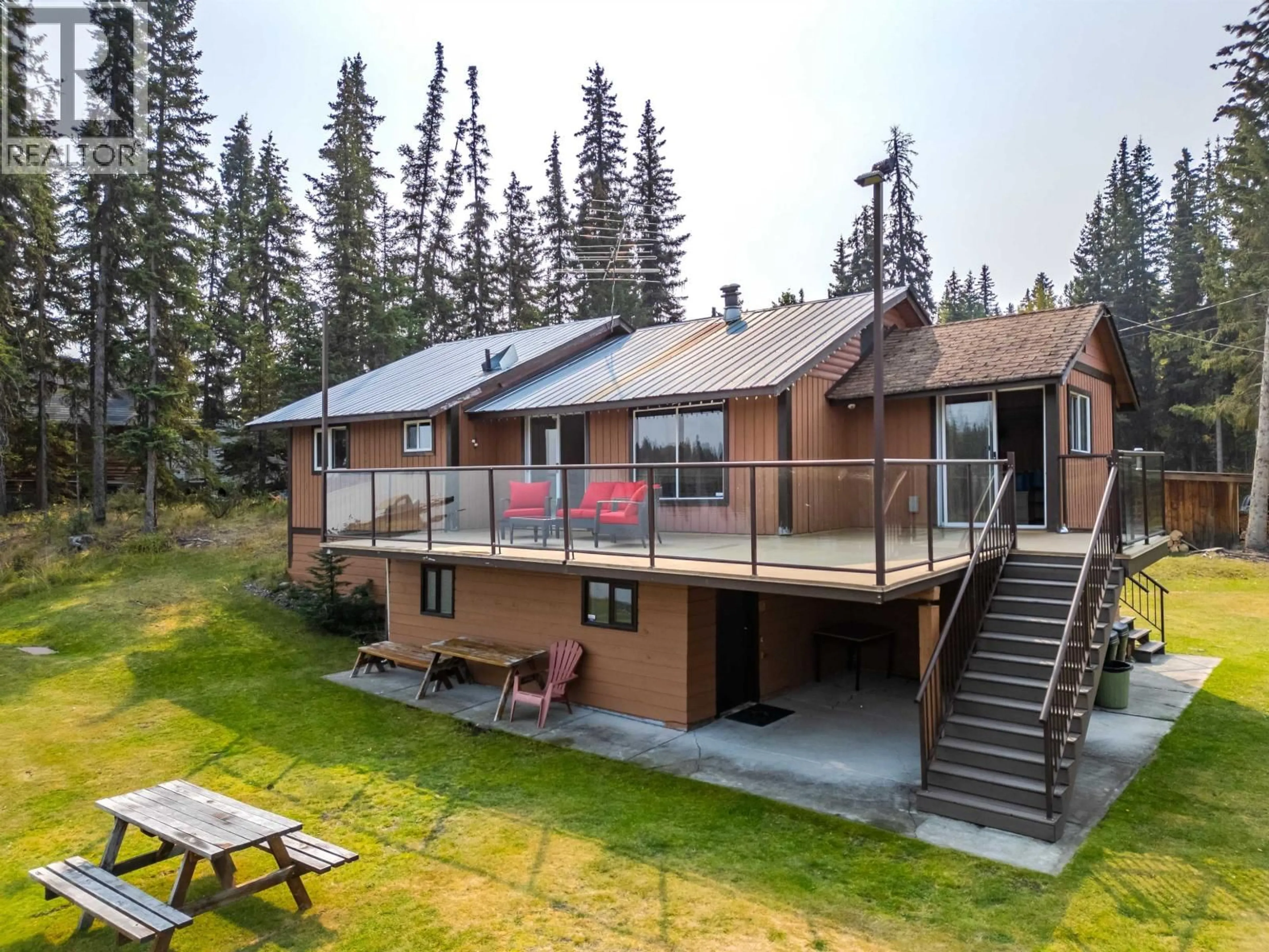 A pic from outside/outdoor area/front of a property/back of a property/a pic from drone, mountain view for 7177 NATH ROAD, Bridge Lake British Columbia V0K1X1