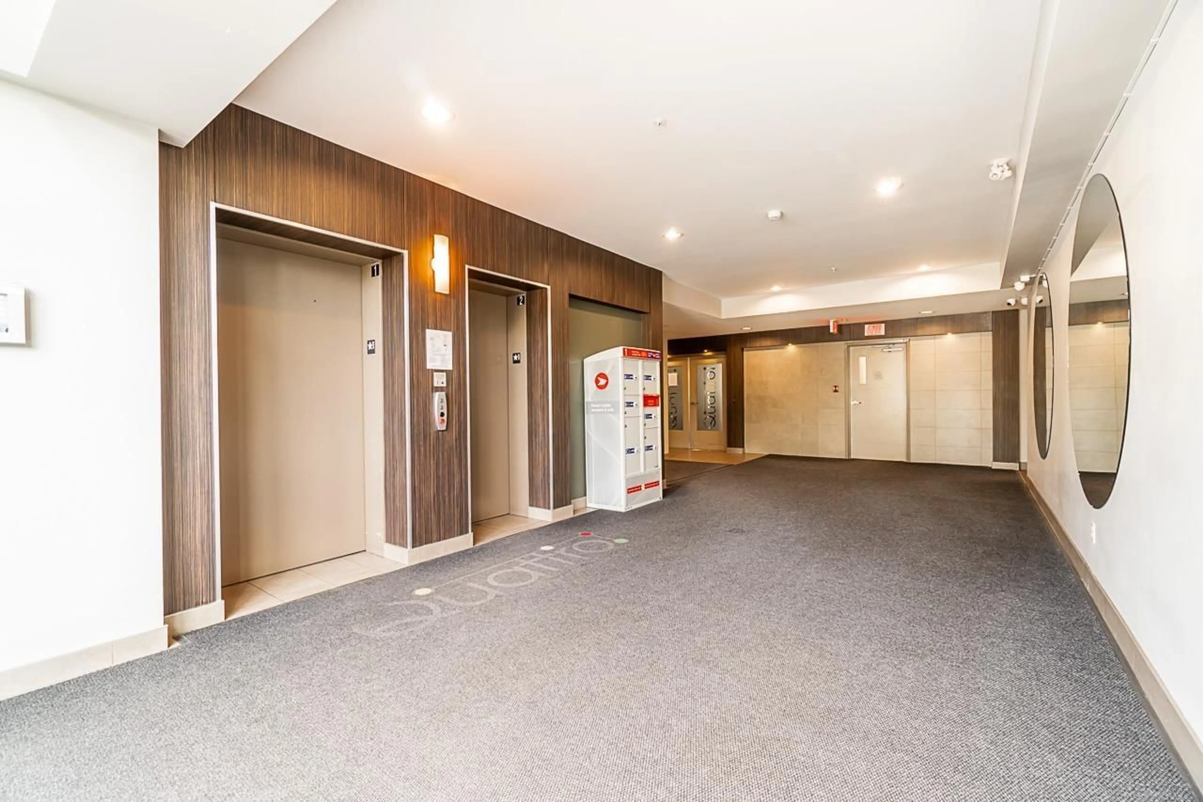 Indoor foyer for 401 - 13728 108 AVENUE, Surrey British Columbia V3T0B7